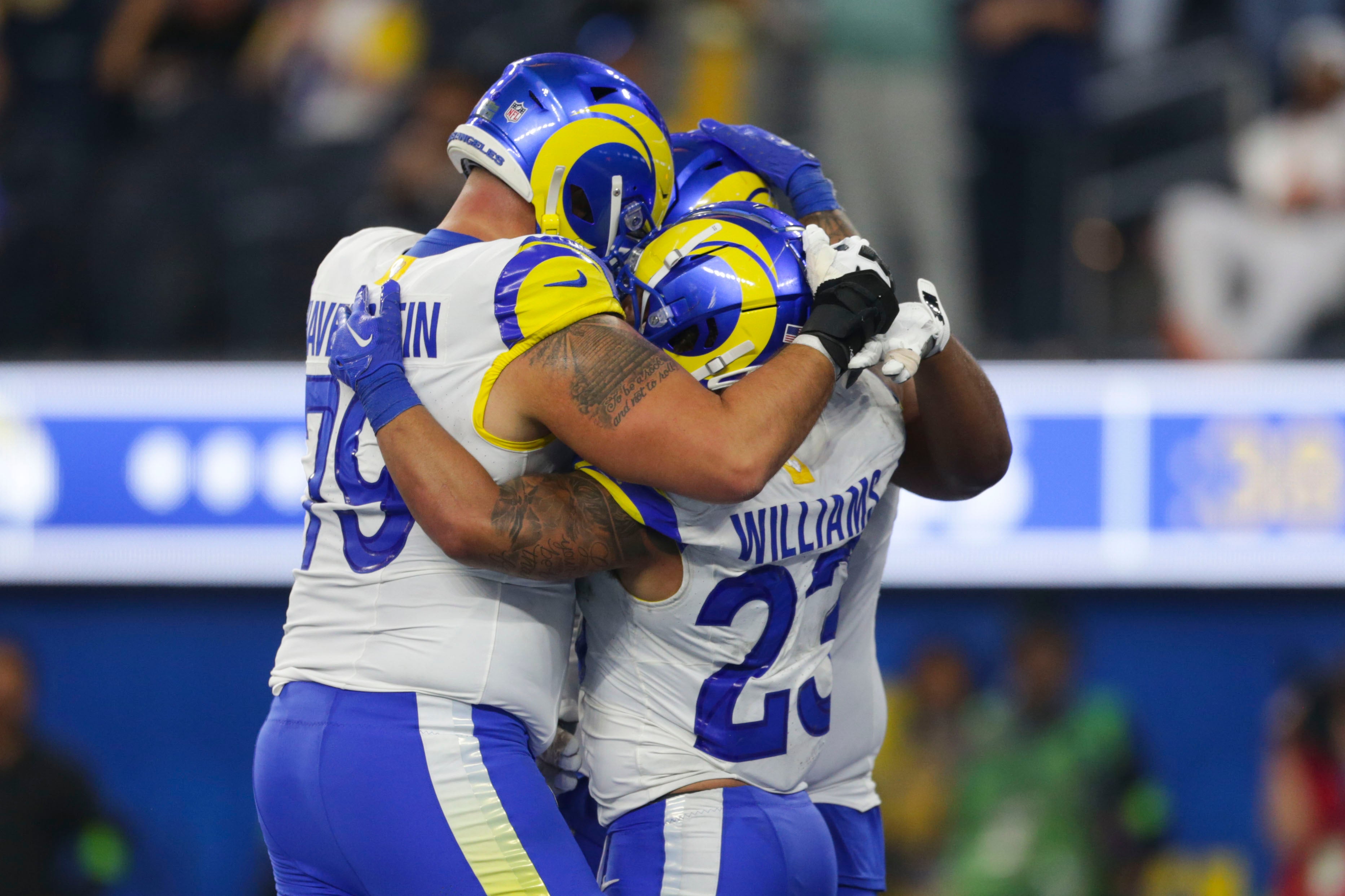 Dec 3, 2023; Inglewood, California, USA; Los Angeles Rams offensive linesmen Rob Havenstein (79) Los Angeles Rams running back Kyren Williams (23) and Los Angeles Rams offensive linesmen Steve Avila (73) celebrate during the second half in a game against the Cleveland Browns at SoFi Stadium. Mandatory Credit: Yannick Peterhans-USA TODAY Sports