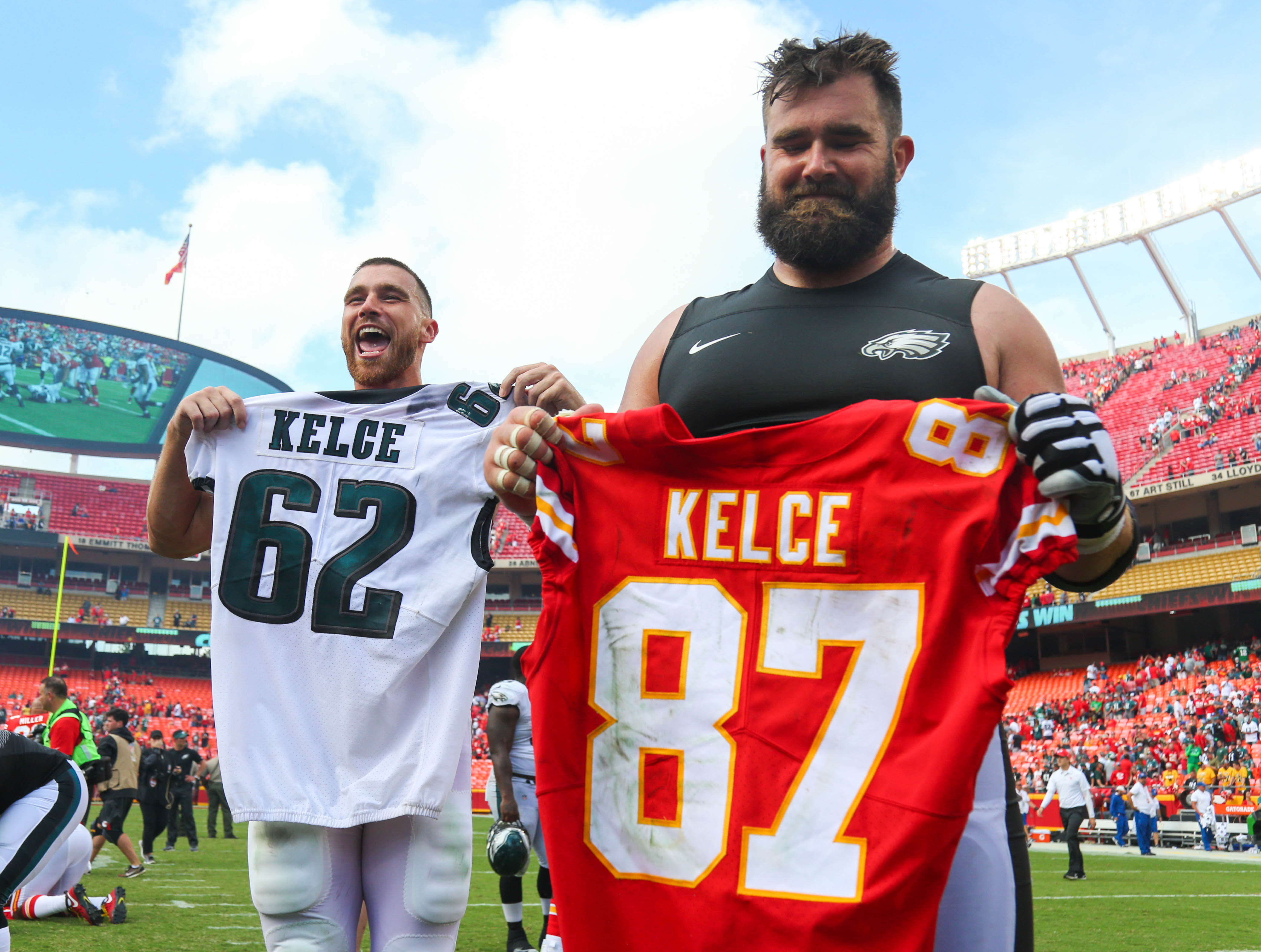 Kansas City Chiefs tight end Travis Kelce and Philadelphia Eagles center Jason Kelce swap jersey after the game at Arrowhead Stadium