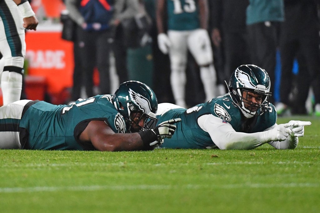 Philadelphia Eagles defensive tackle Fletcher Cox and defensive end Brandon Graham celebrate a sack against the San Francisco 49ers during the third quarter at Lincoln Financial Field.