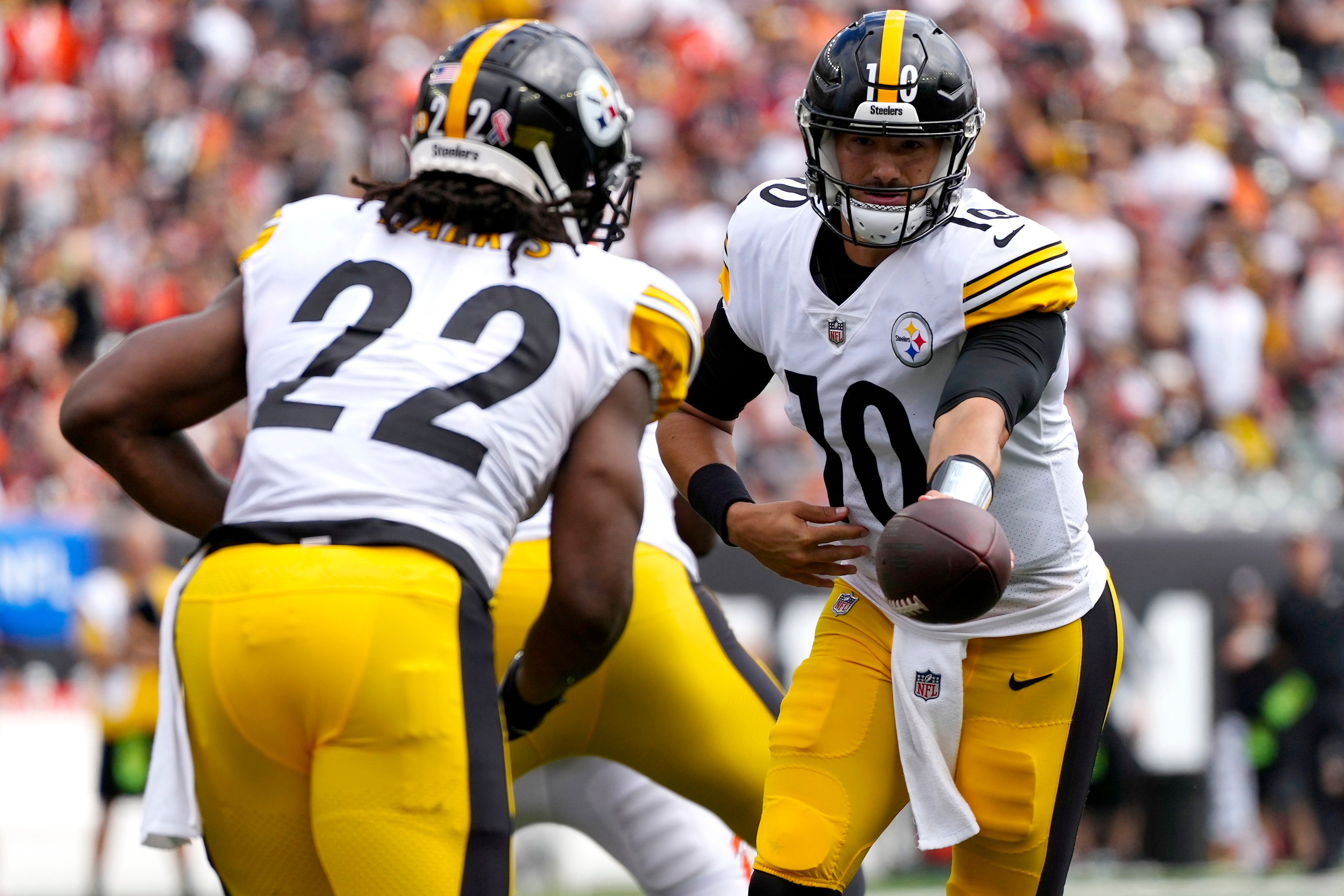 Sep 11, 2022; Cincinnati, Ohio, USA; Pittsburgh Steelers quarterback Mitch Trubisky (10) hands the ball off to running back Najee Harris (22) during the third quarter of a Week 1 NFL football game against the Cincinnati Bengals at Paycor Stadium. Mandatory Credit: Sam Greene-USA TODAY Sports