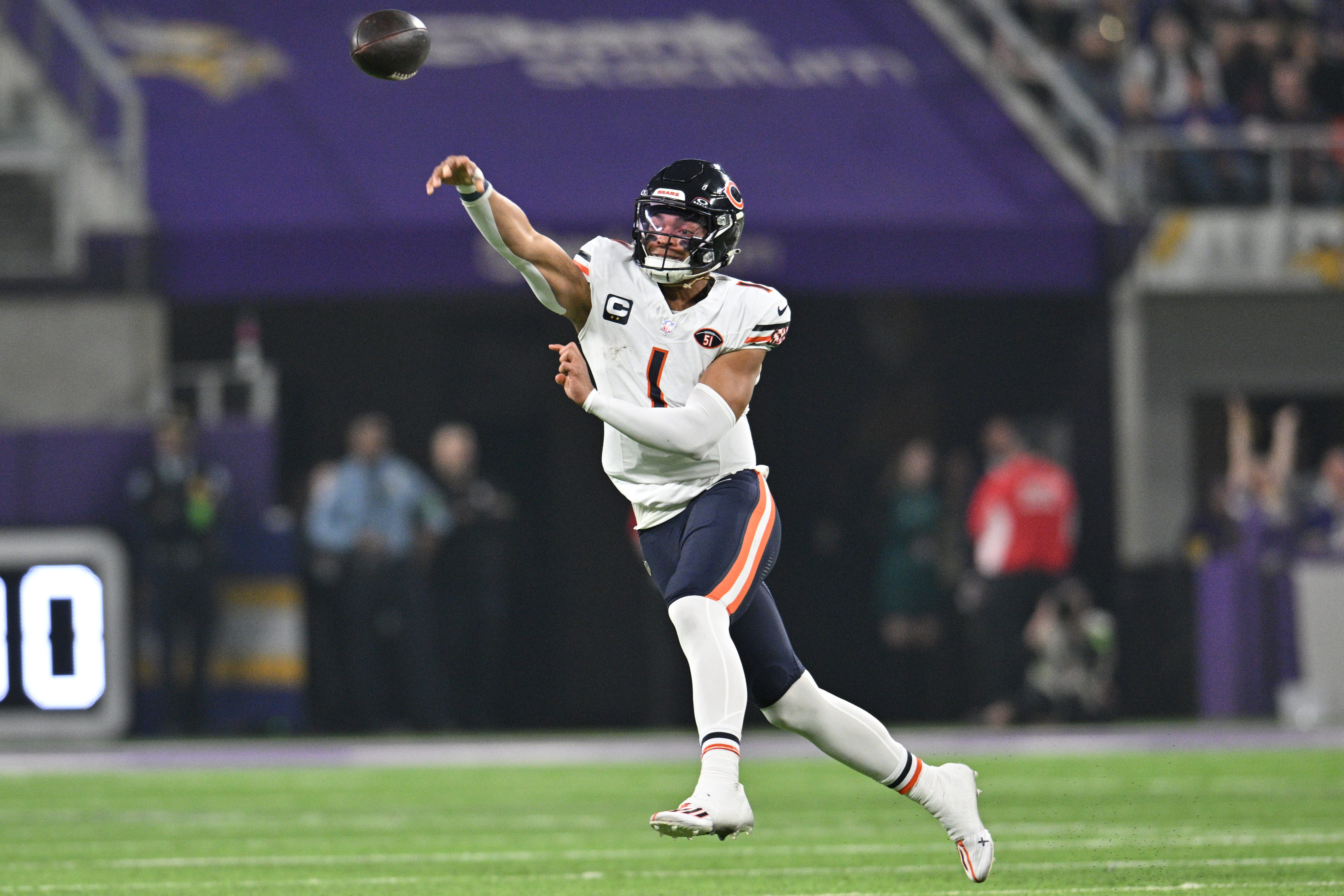 Nov 27, 2023; Minneapolis, Minnesota, USA; Chicago Bears quarterback Justin Fields (1) throws a pass against the Minnesota Vikings during the first quarter at U.S. Bank Stadium.