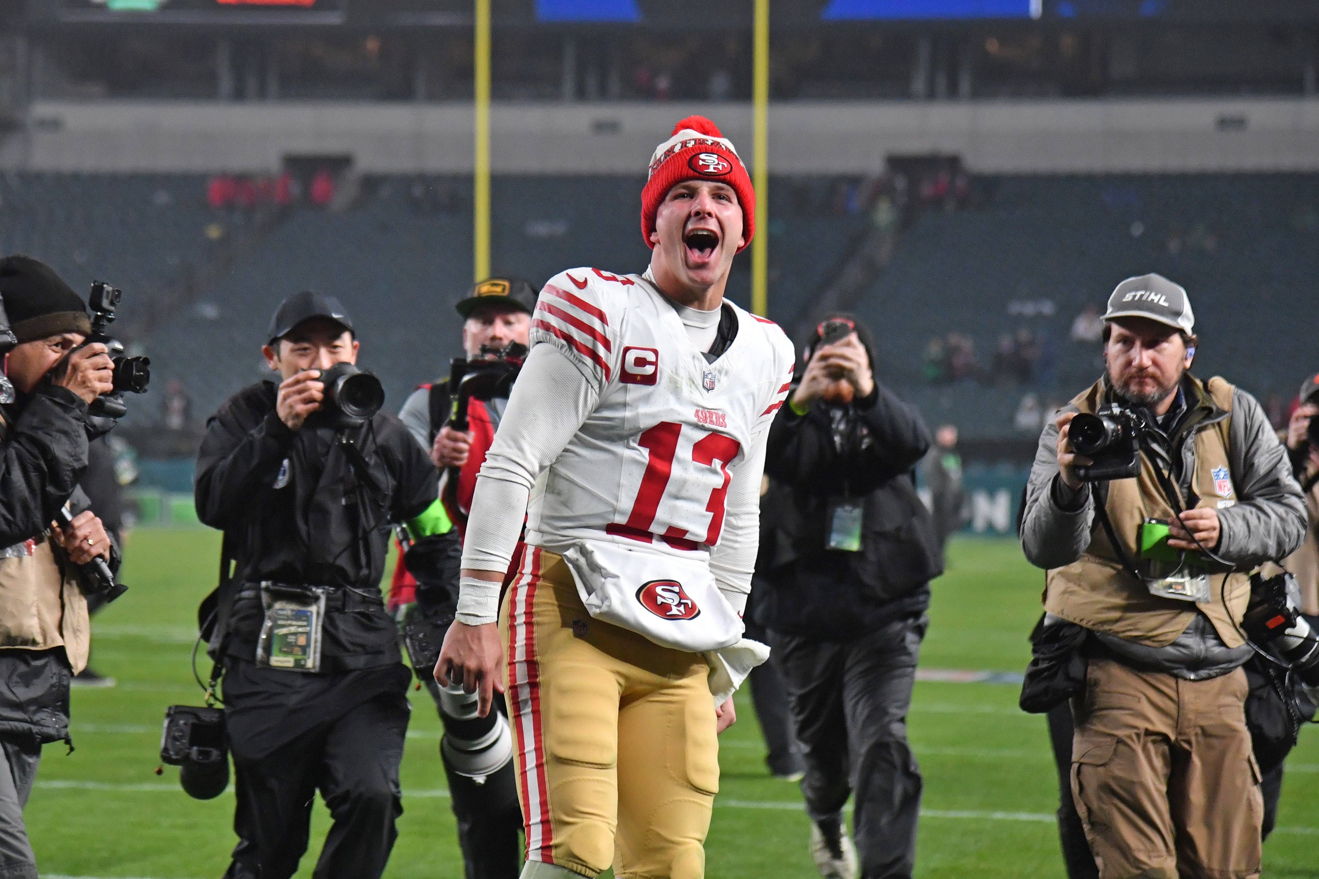 Dec 3, 2023; Philadelphia, Pennsylvania, USA; San Francisco 49ers quarterback Brock Purdy (13) walks off the field after win against the Philadelphia Eagles at Lincoln Financial Field.