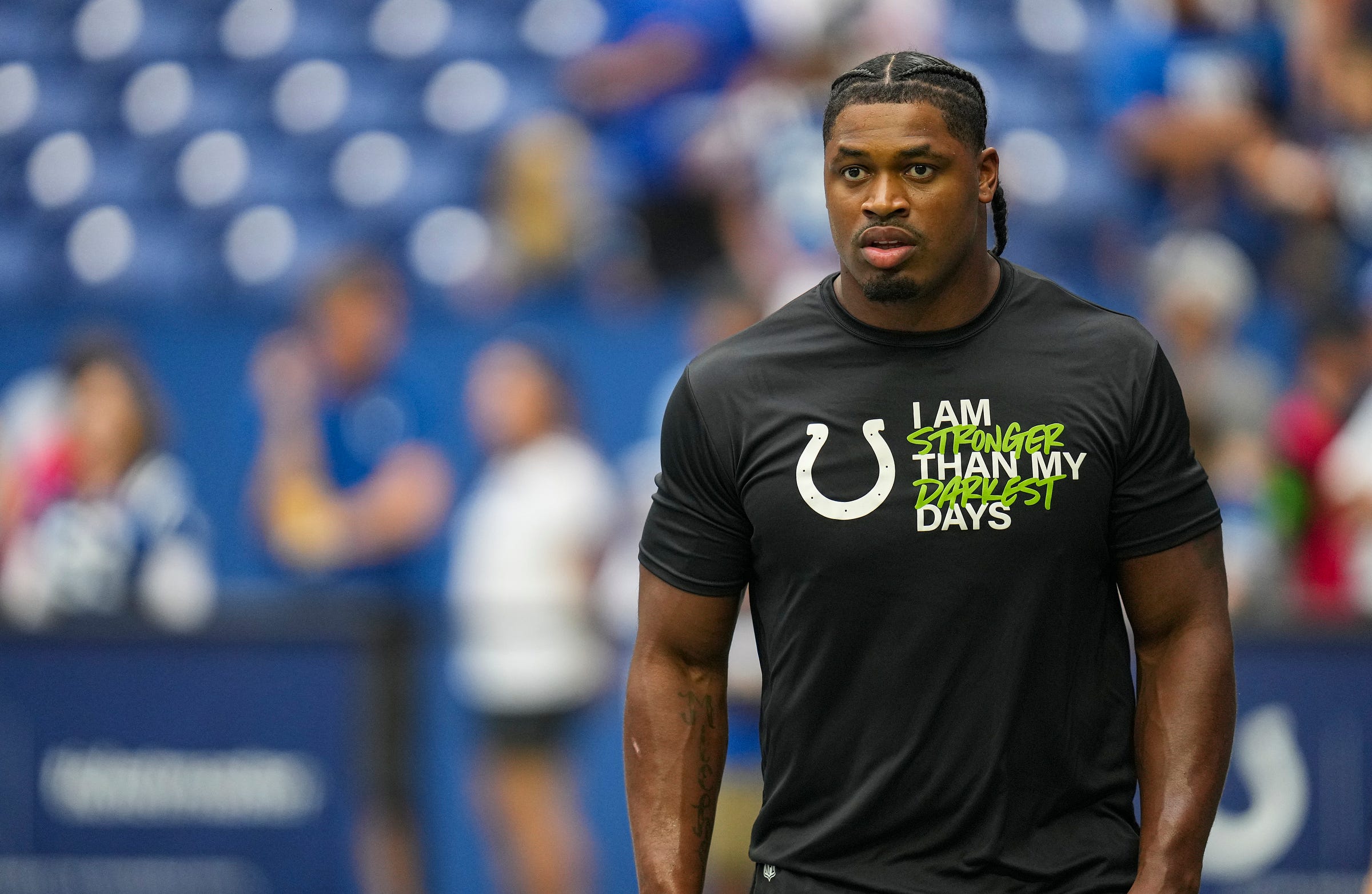 Indianapolis Colts defensive end Al-Quadin Muhammad (97) warms up before facing the Chicago Bears in an NFL preseason game Saturday, Aug. 19, 2023, at Lucas Oil Stadium in Indianapolis.