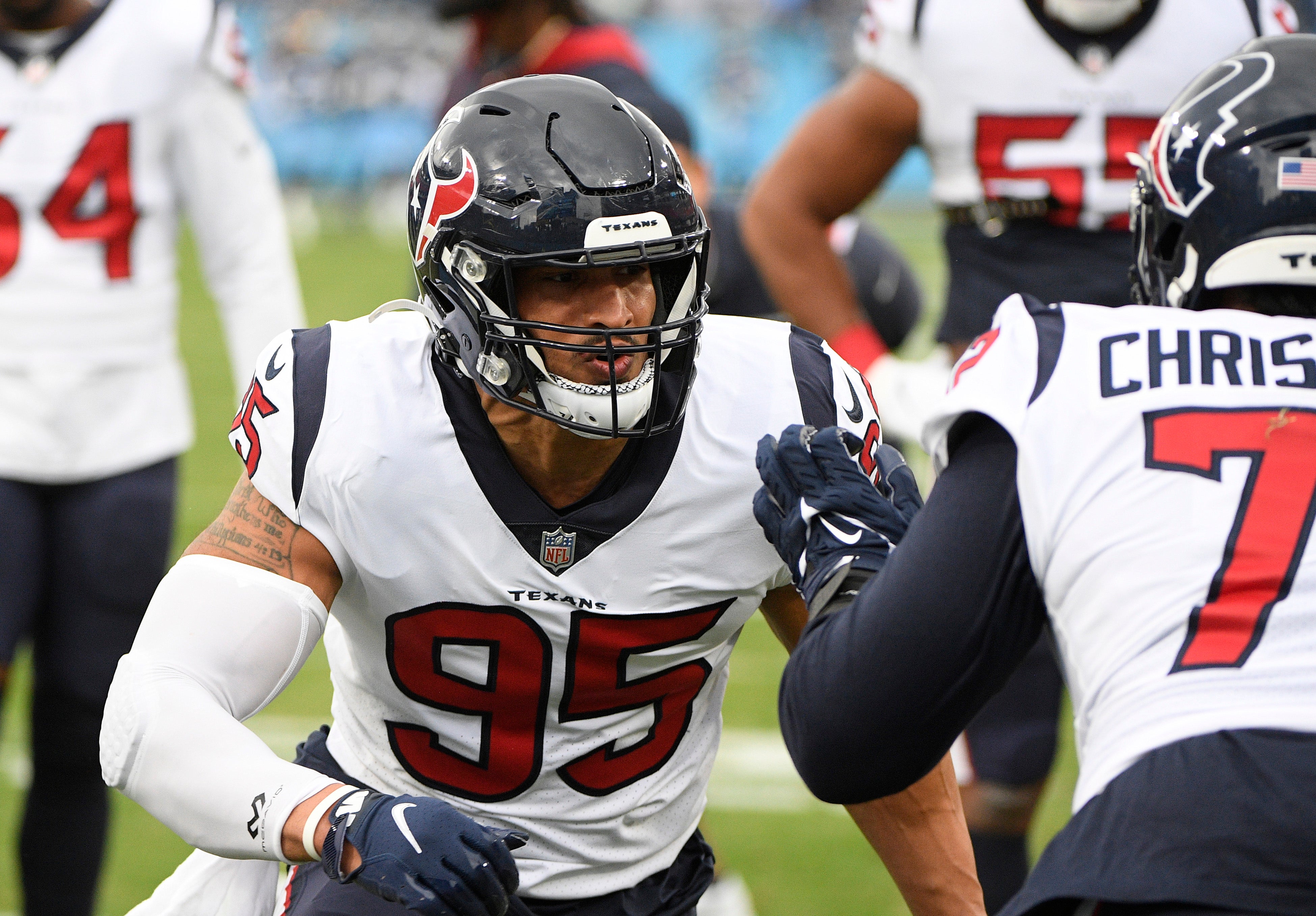 Nov 21, 2021; Nashville, Tennessee, USA; Houston Texans defensive end Derek Rivers (95) goes through drills against the Tennessee Titans during pre-game warm ups at Nissan Stadium.