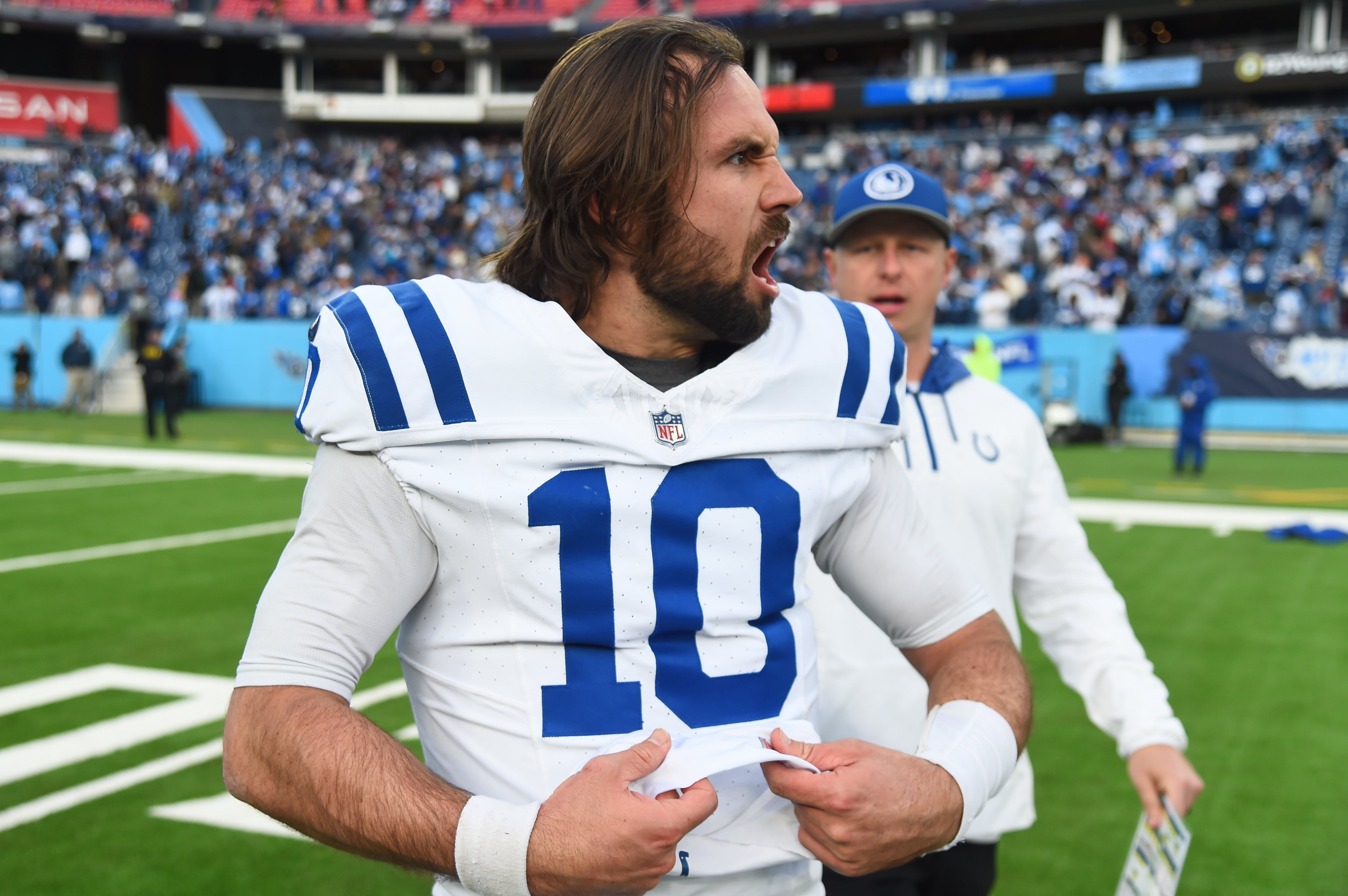Dec 3, 2023; Nashville, Tennessee, USA; Indianapolis Colts quarterback Gardner Minshew (10) celebrates with teammates after throwing the game-winning touchdown in overtime against the Tennessee Titans at Nissan Stadium.