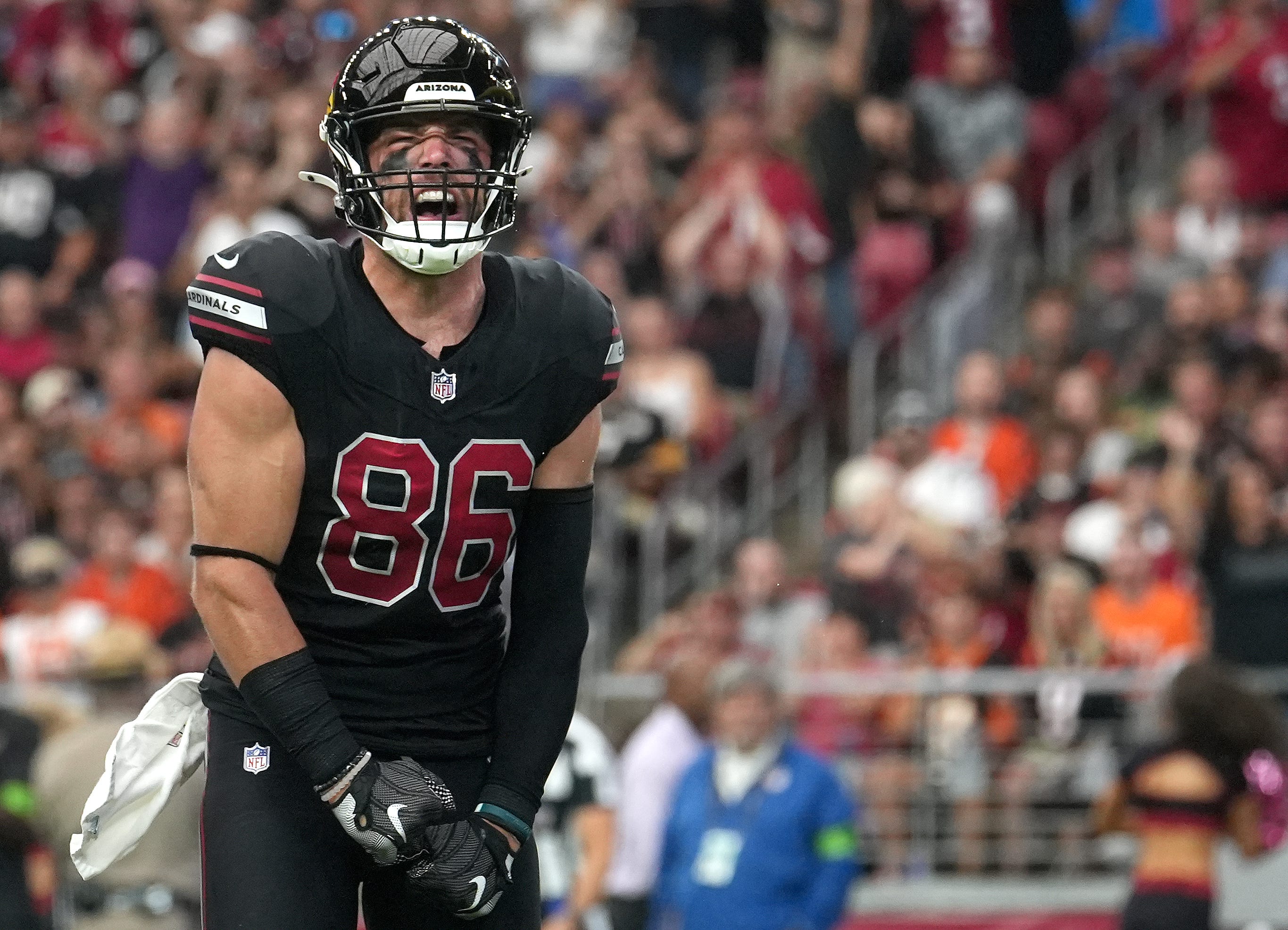 Arizona Cardinals tight end Zach Ertz (86) celebrates his touchdown reception against the Cincinnati Bengals at State Farm Stadium in Glendale on Oct. 8, 2023.