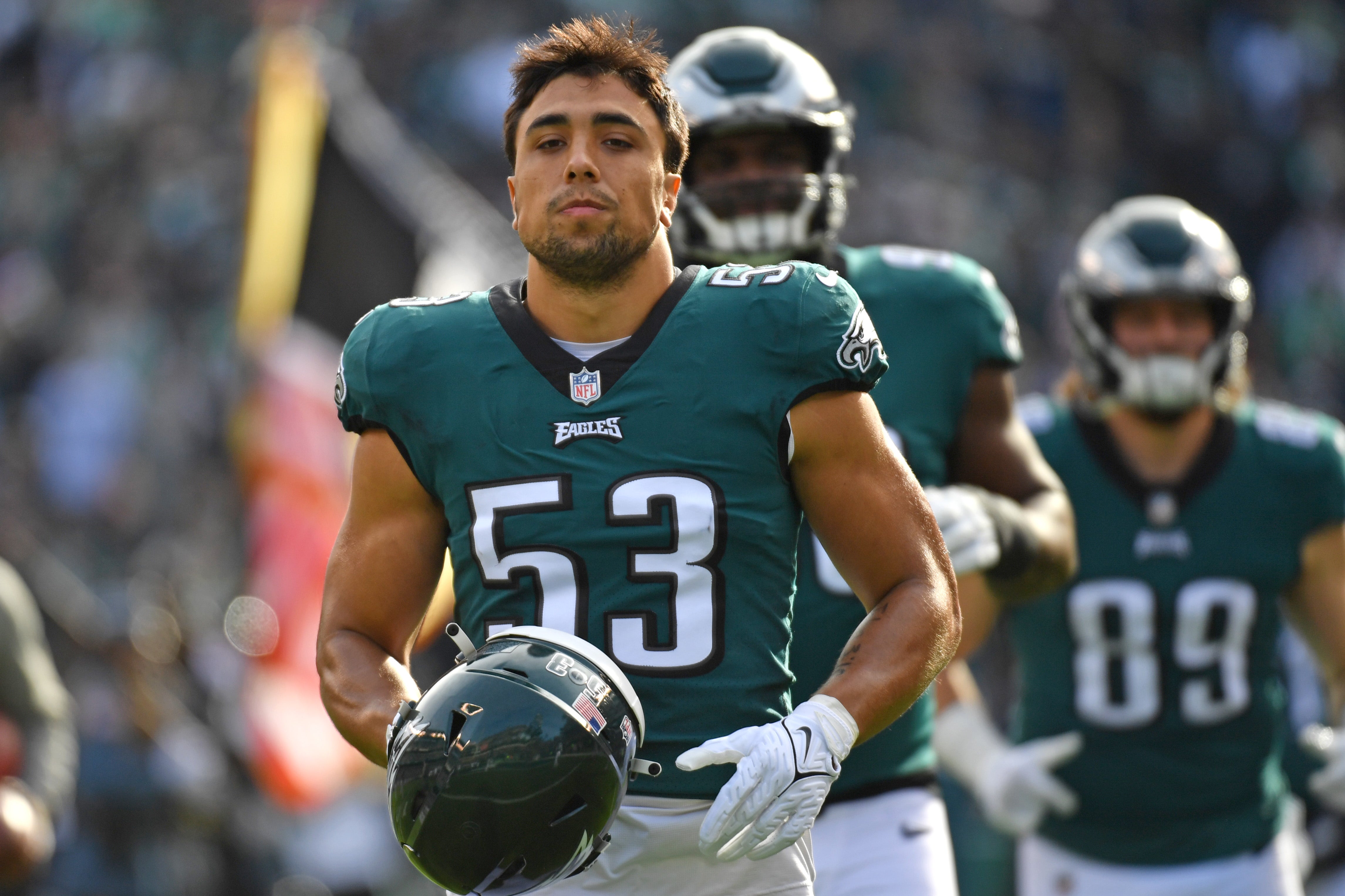 Philadelphia Eagles linebacker Christian Elliss runs onto the field against the Tennessee Titans at Lincoln Financial Field.
