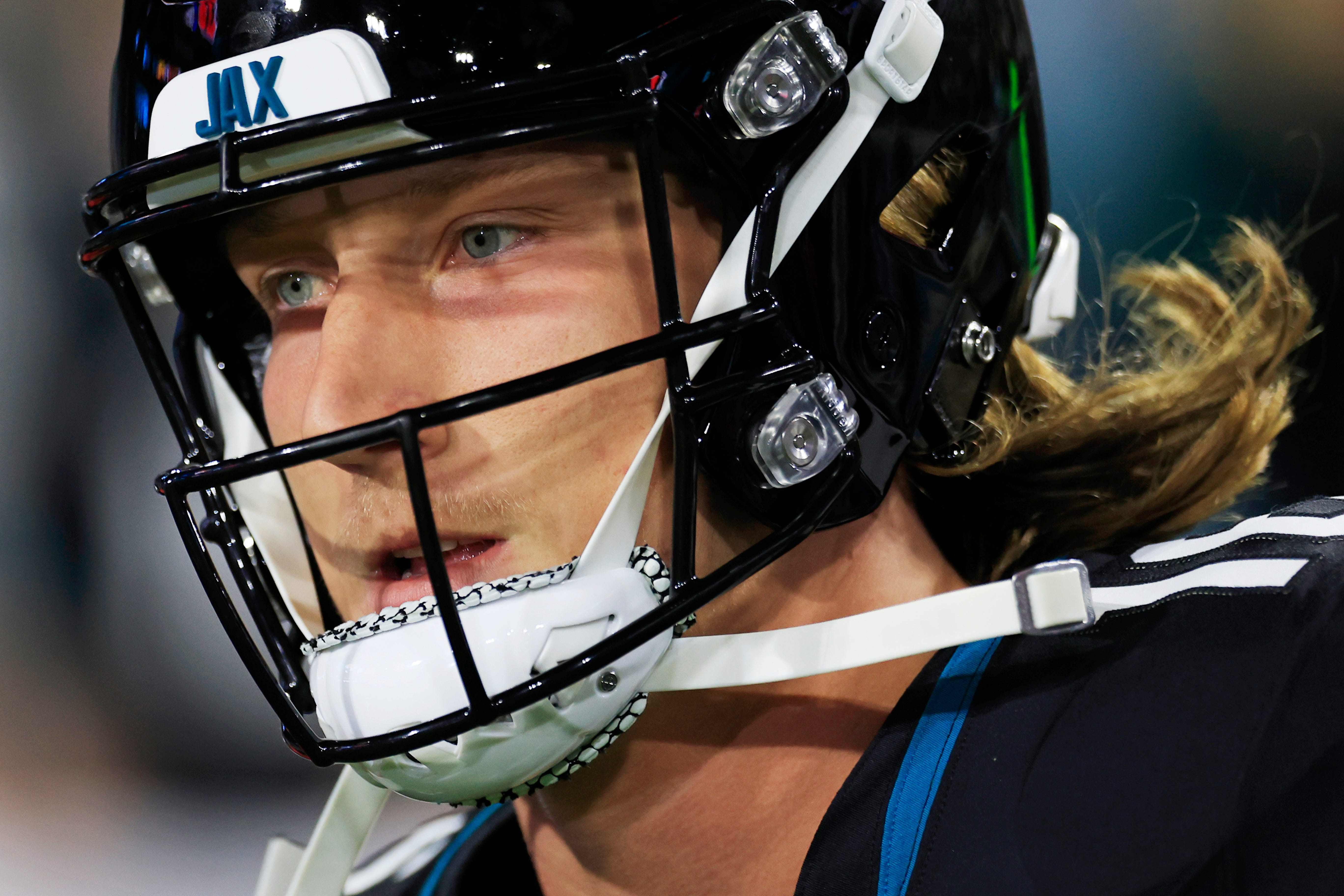 Jacksonville Jaguars quarterback Trevor Lawrence runs onto the field before a regular season NFL football matchup Monday, Dec. 4, 2023 at EverBank Stadium in Jacksonville, Fla. The Cincinnati Bengals defeated the Jacksonville Jaguars 34-31 in overtime.
