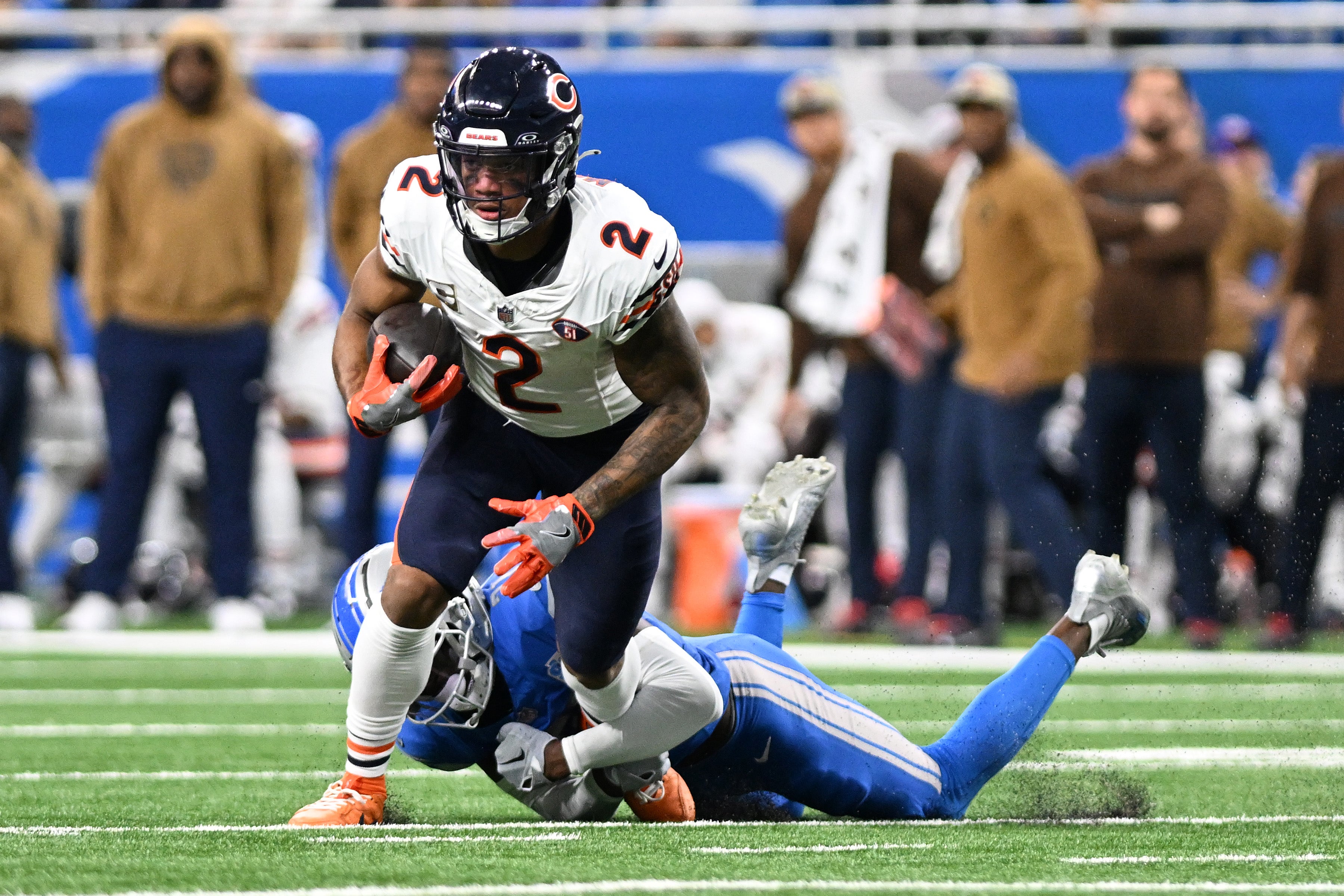 Nov 19, 2023; Detroit, Michigan, USA; Chicago Bears wide receiver DJ Moore (2) runs with the ball against the Detroit Lions in the second quarter at Ford Field.