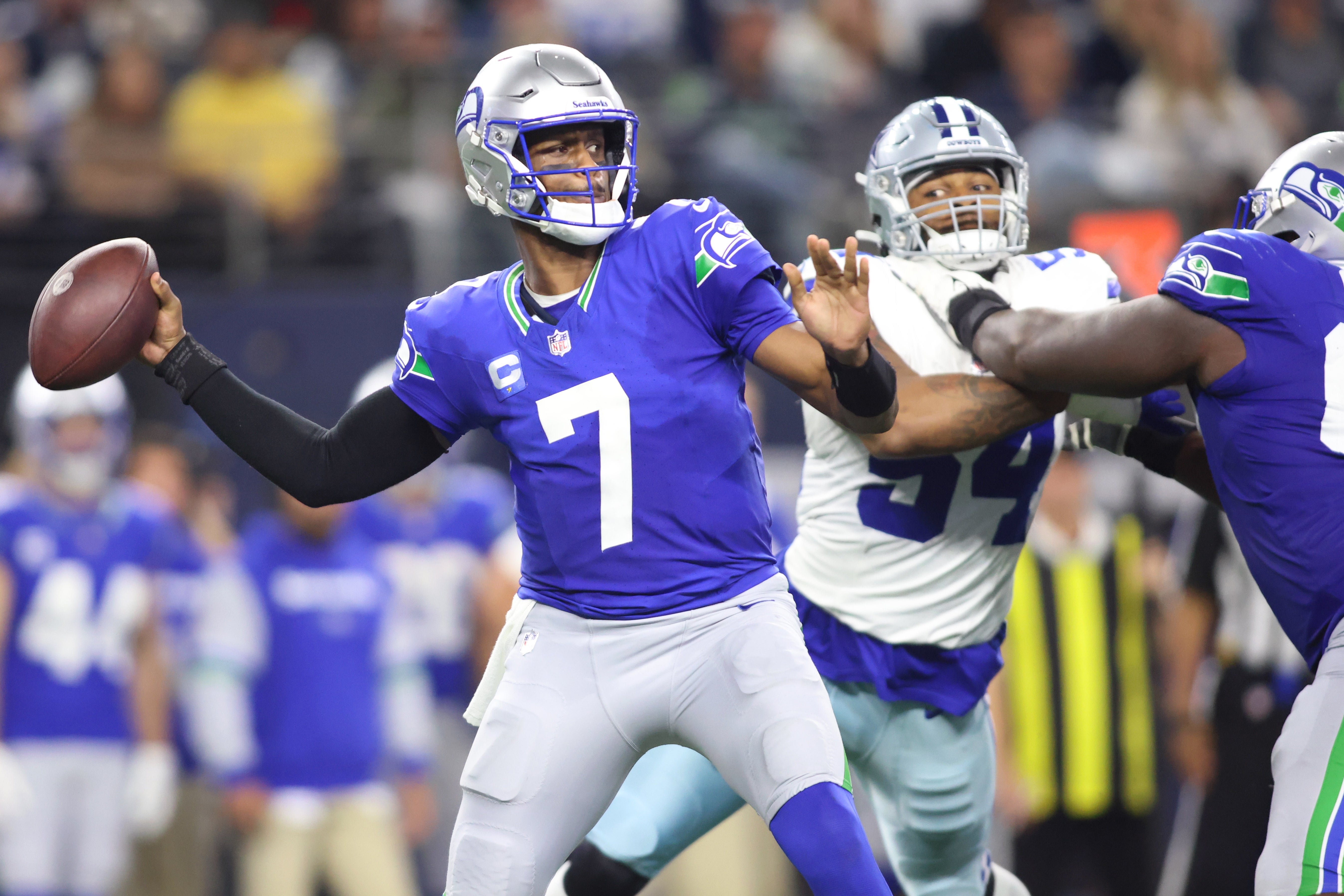 Nov 30, 2023; Arlington, Texas, USA; Seattle Seahawks quarterback Geno Smith (7) throws to pass against the Dallas Cowboys during the second half at AT&T Stadium.