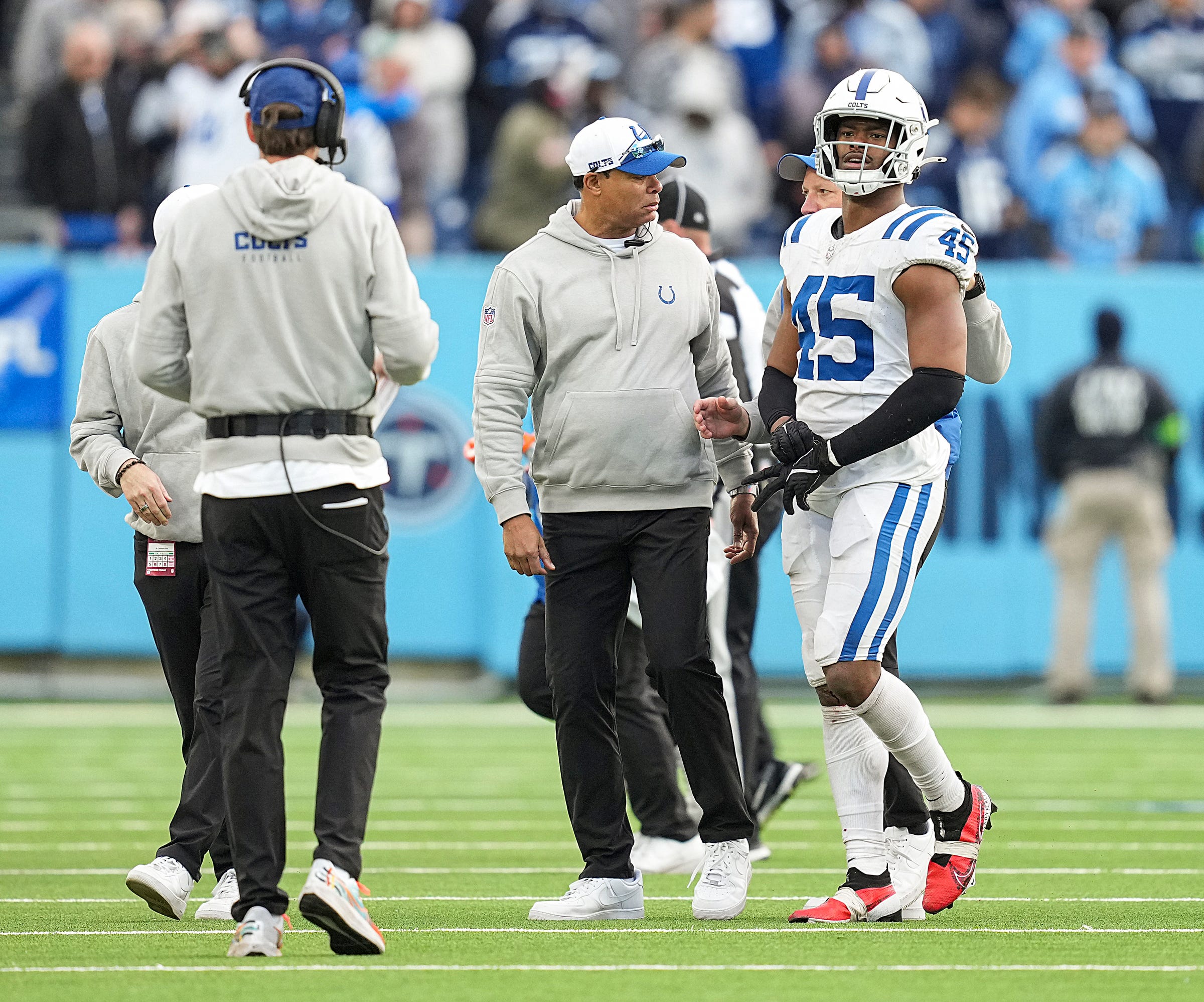 Indianapolis Colts linebacker E.J. Speed (45) walks toward the bench to be checked for an injury Sunday, Dec. 3, 2023, at Nissan Stadium in Nashville, Tenn. The Colts won in overtime, 31-28.