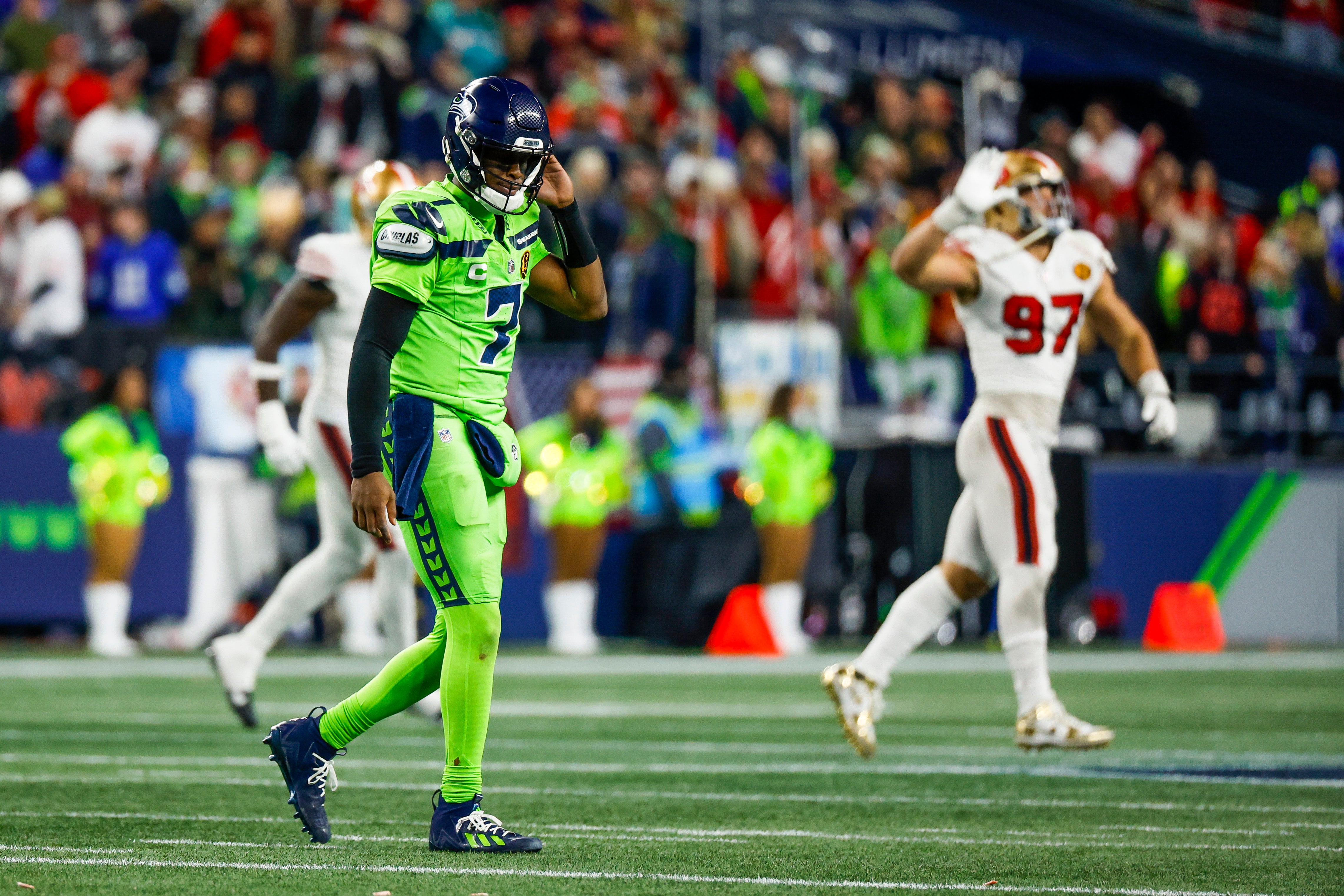 Nov 23, 2023; Seattle, Washington, USA; Seattle Seahawks quarterback Geno Smith (7) reacts following a failed third down conversion against the San Francisco 49ers during the fourth quarter at Lumen Field.