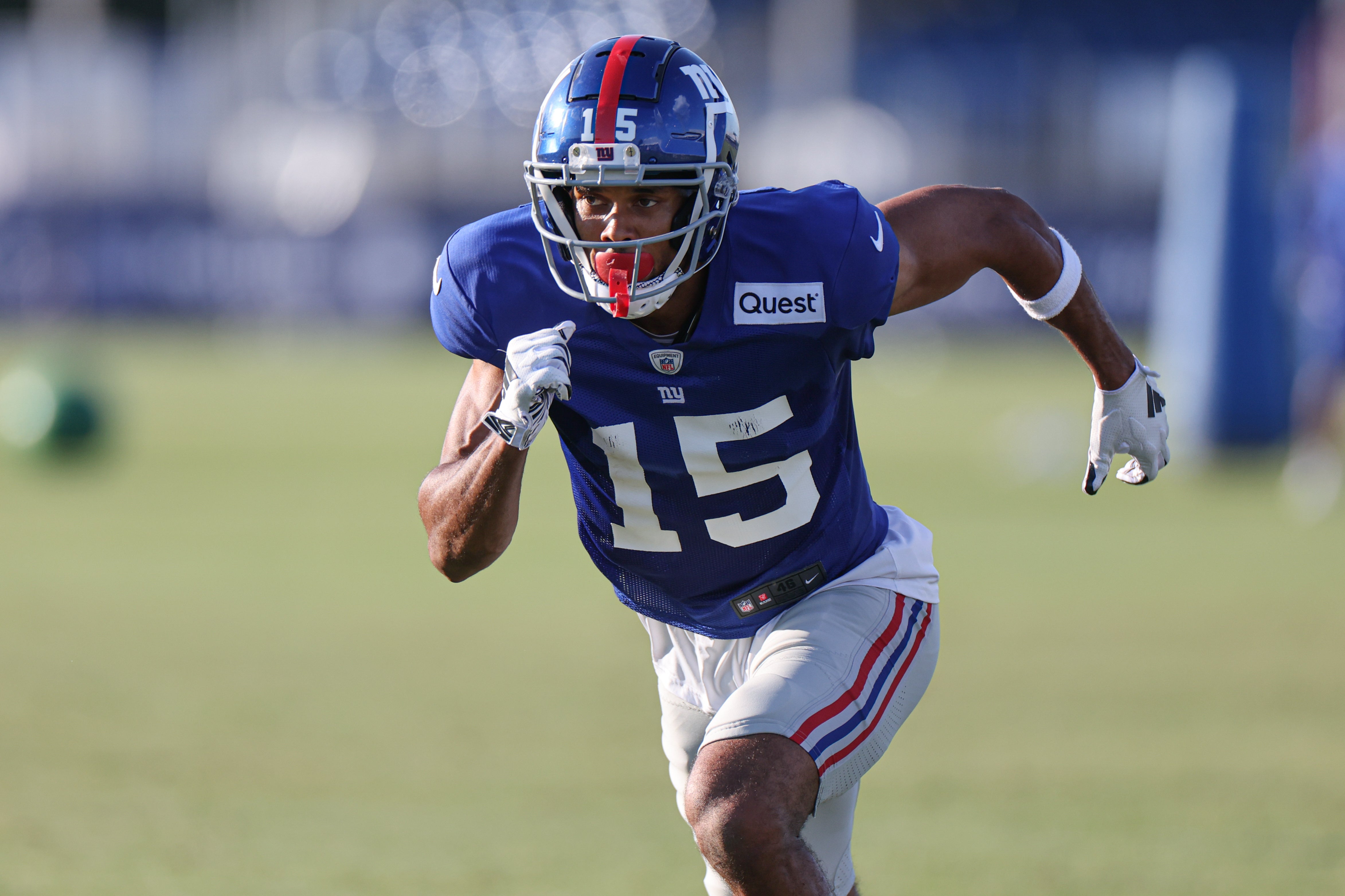 Aug 1, 2023; East Rutherford, NJ, USA; New York Giants wide receiver Collin Johnson (15) runs a drill during training camp at the Quest Diagnostics Training Facility.
