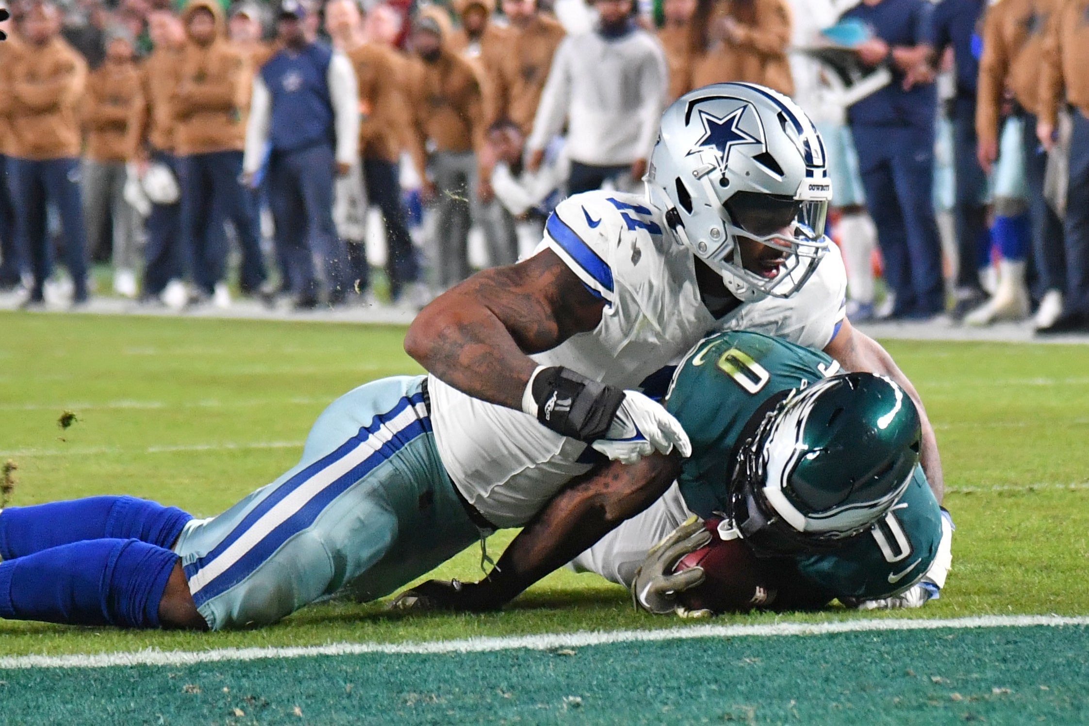 Dallas Cowboys linebacker Micah Parsons (11) stops Philadelphia Eagles running back D'Andre Swift (0) short of the goal line during the second quarter at Lincoln Financial Field.