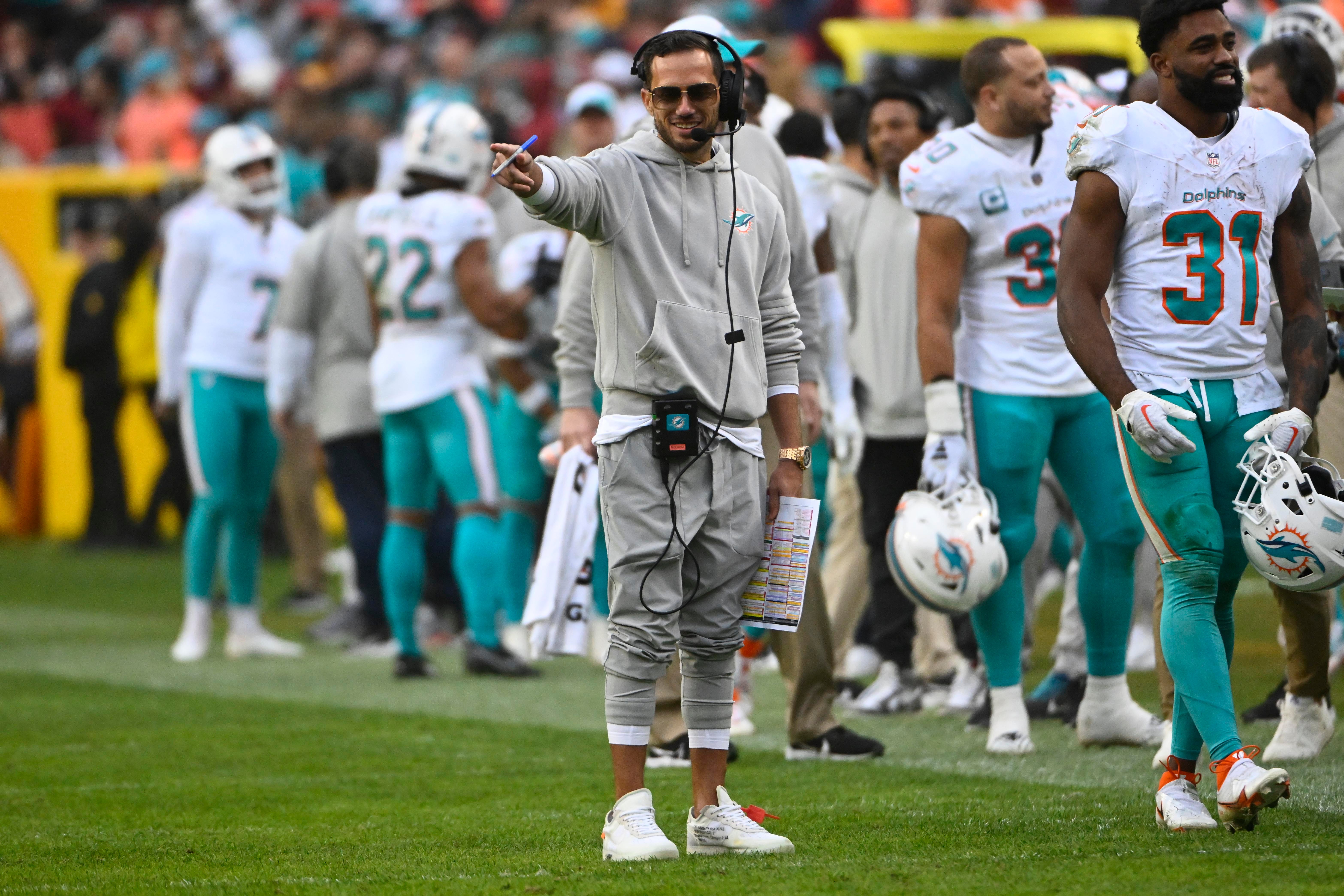 Miami Dolphins head coach Mike McDaniel gestures against the Washington Commanders during the second half at FedExField.