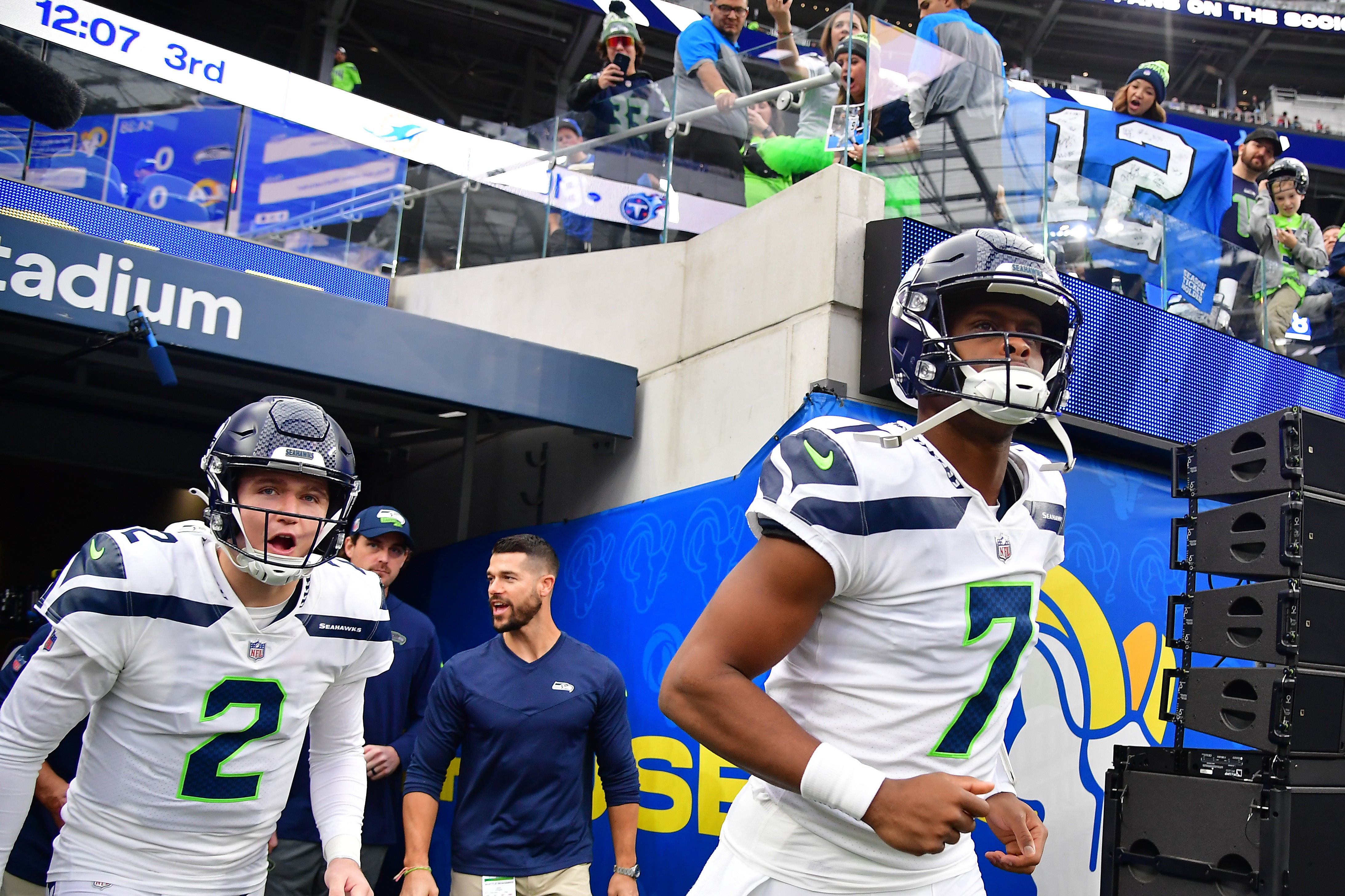 Dec 4, 2022; Inglewood, California, USA; Seattle Seahawks quarterback Geno Smith (7) and quarterback Drew Lock (2) take the field before playing against the Los Angeles Rams at SoFi Stadium.