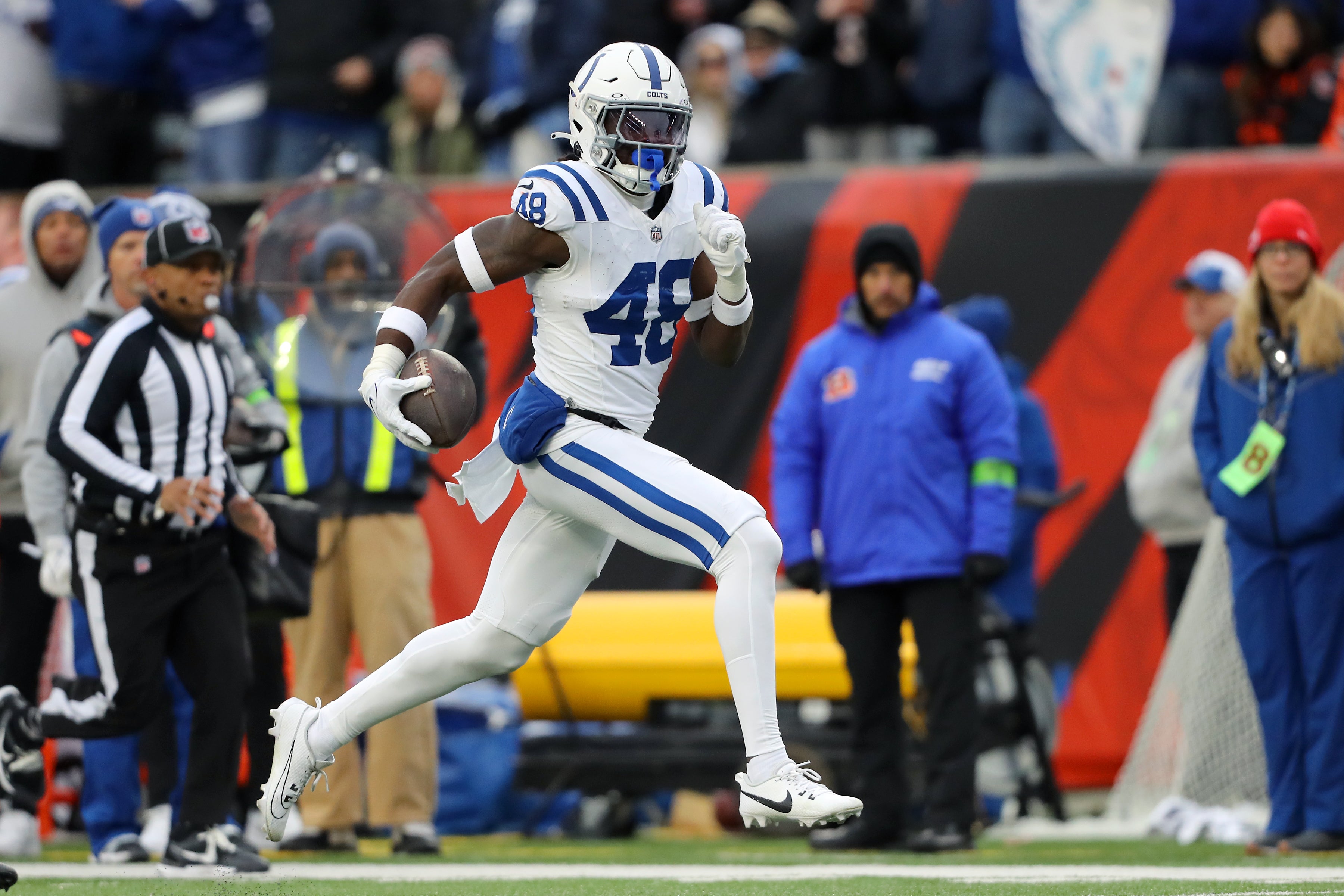 Dec 10, 2023; Cincinnati, Ohio, USA; Indianapolis Colts safety Ronnie Harrison Jr. (48) runs an interception back for a touchdown during the second quarter against the Cincinnati Bengals at Paycor Stadium.