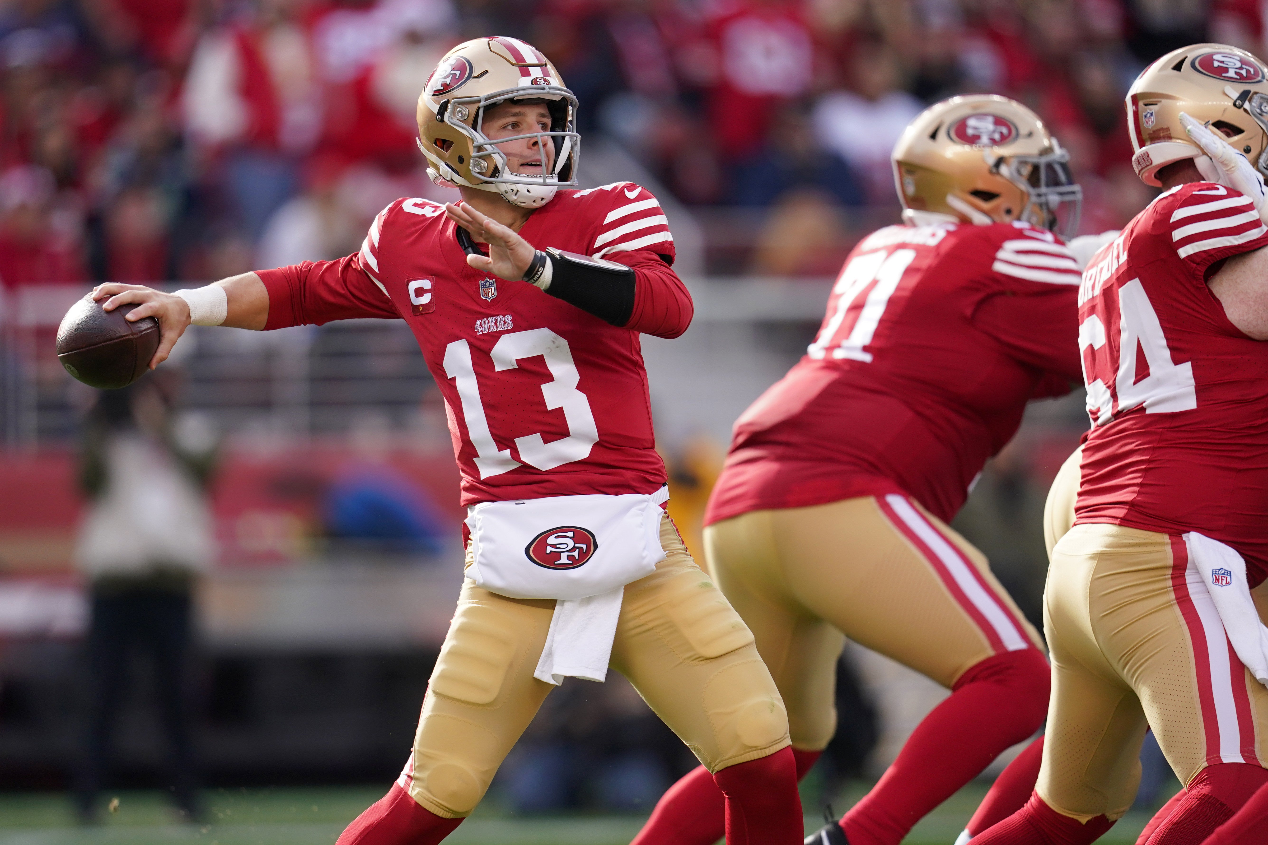 Dec 10, 2023; Santa Clara, California, USA; San Francisco 49ers quarterback Brock Purdy (13) throws a pass against the Seattle Seahawks in the first quarter at Levi's Stadium.
