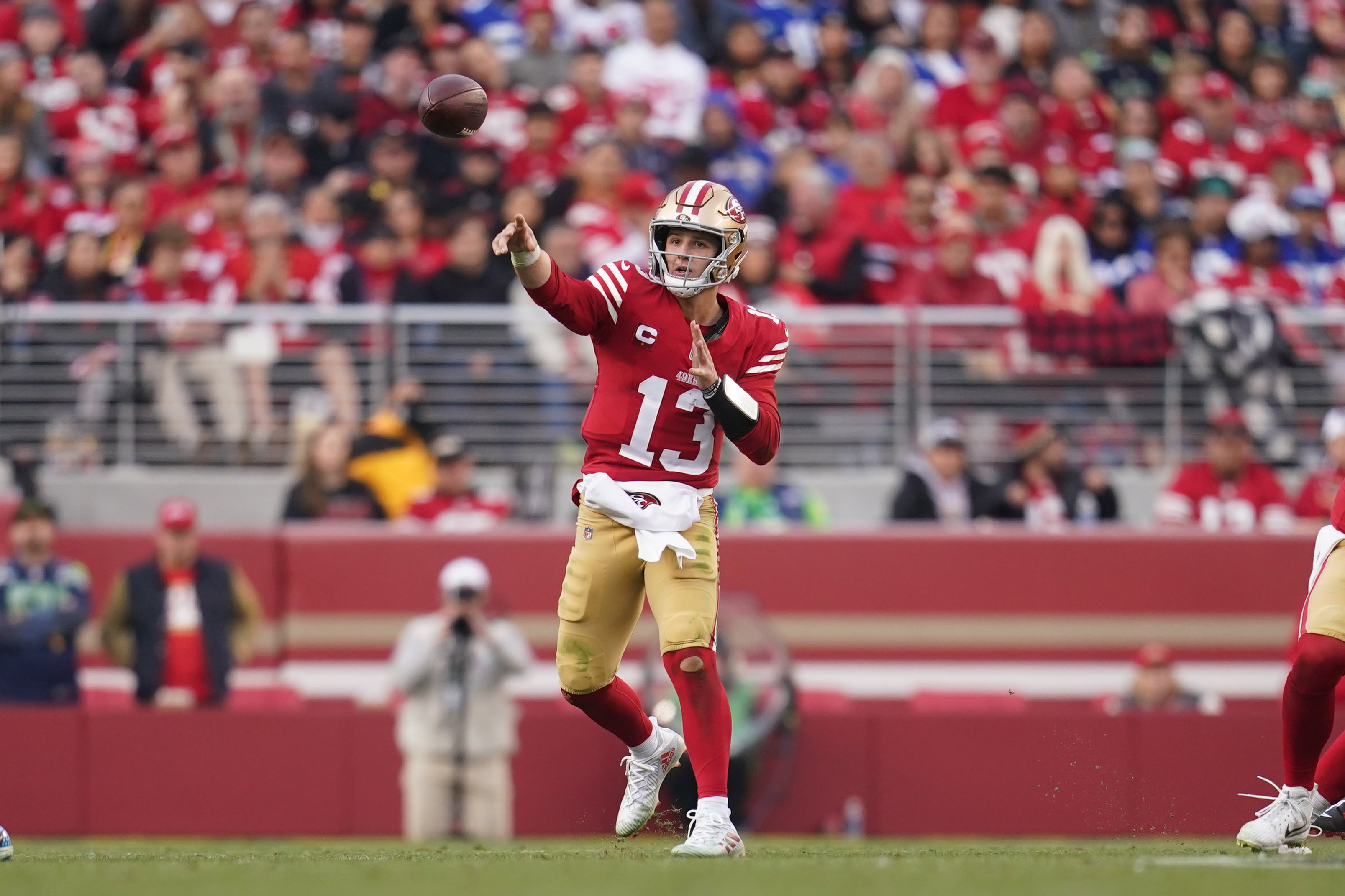 Dec 10, 2023; Santa Clara, California, USA; San Francisco 49ers quarterback Brock Purdy (13) throws a pass against the Seattle Seahawks in the fourth quarter at Levi's Stadium.