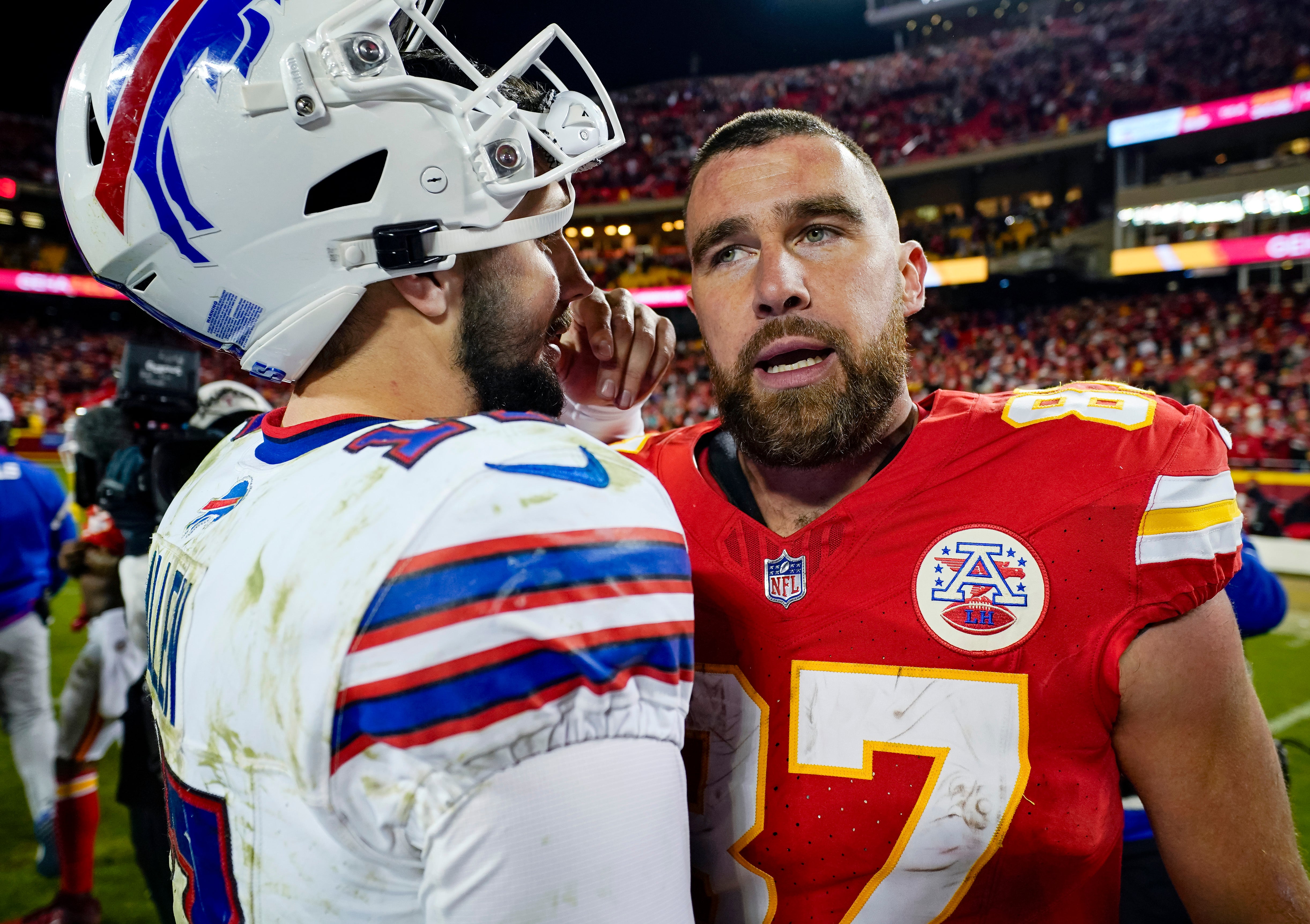 Buffalo Bills quarterback Josh Allen greets Kansas City Chiefs tight end Travis Kelce after a game at GEHA Field at Arrowhead Stadium