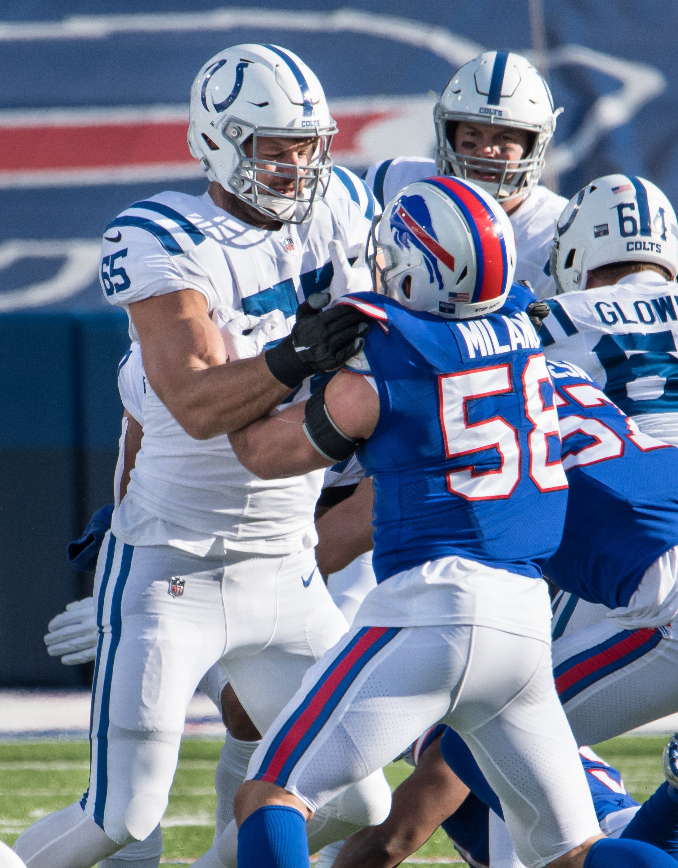 Jan 9, 2021; Orchard Park, New York, USA; Indianapolis Colts offensive tackle Jared Veldheer (65) blocks Buffalo Bills outside linebacker Matt Milano (58) in the first quarter wildcard playoff game at Bills Stadium.