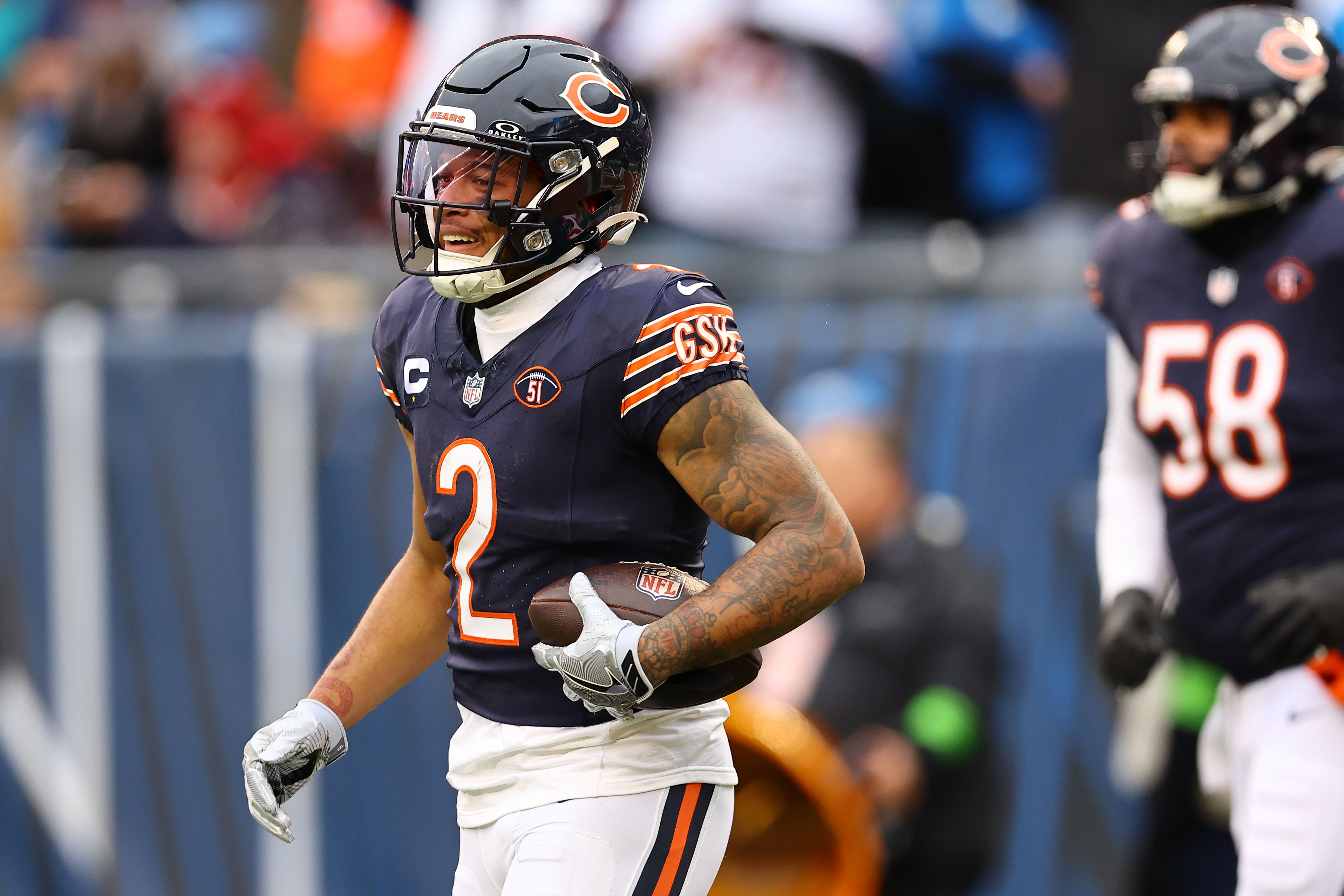 Dec 10, 2023; Chicago, Illinois, USA; Chicago Bears wide receiver DJ Moore (2) reacts after scoring a touchdown against the Detroit Lions during the first half at Soldier Field.