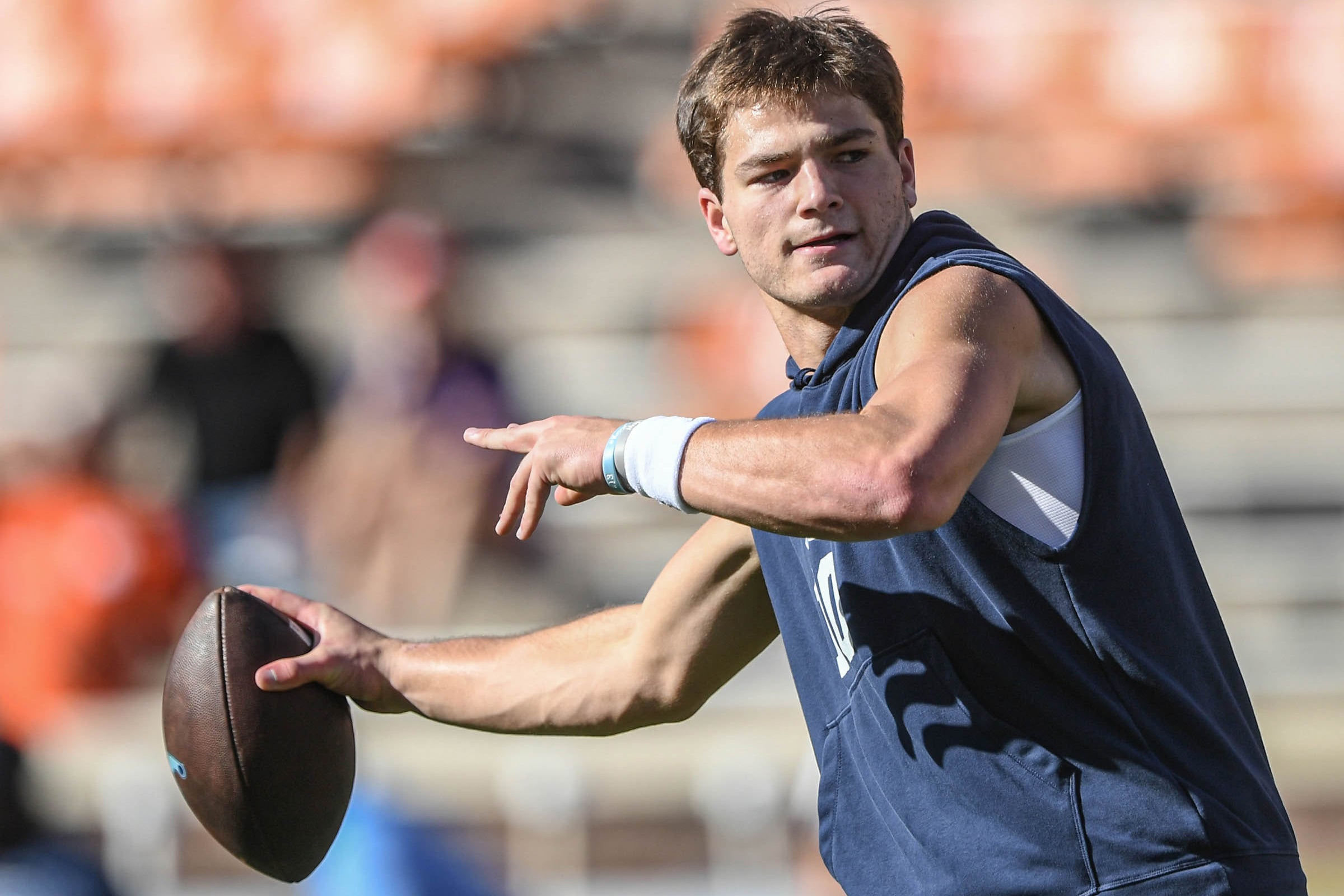North Carolina Tar Heels quarterback Drake Maye warms up before a game against the Clemson Tigers at Memorial Stadium.