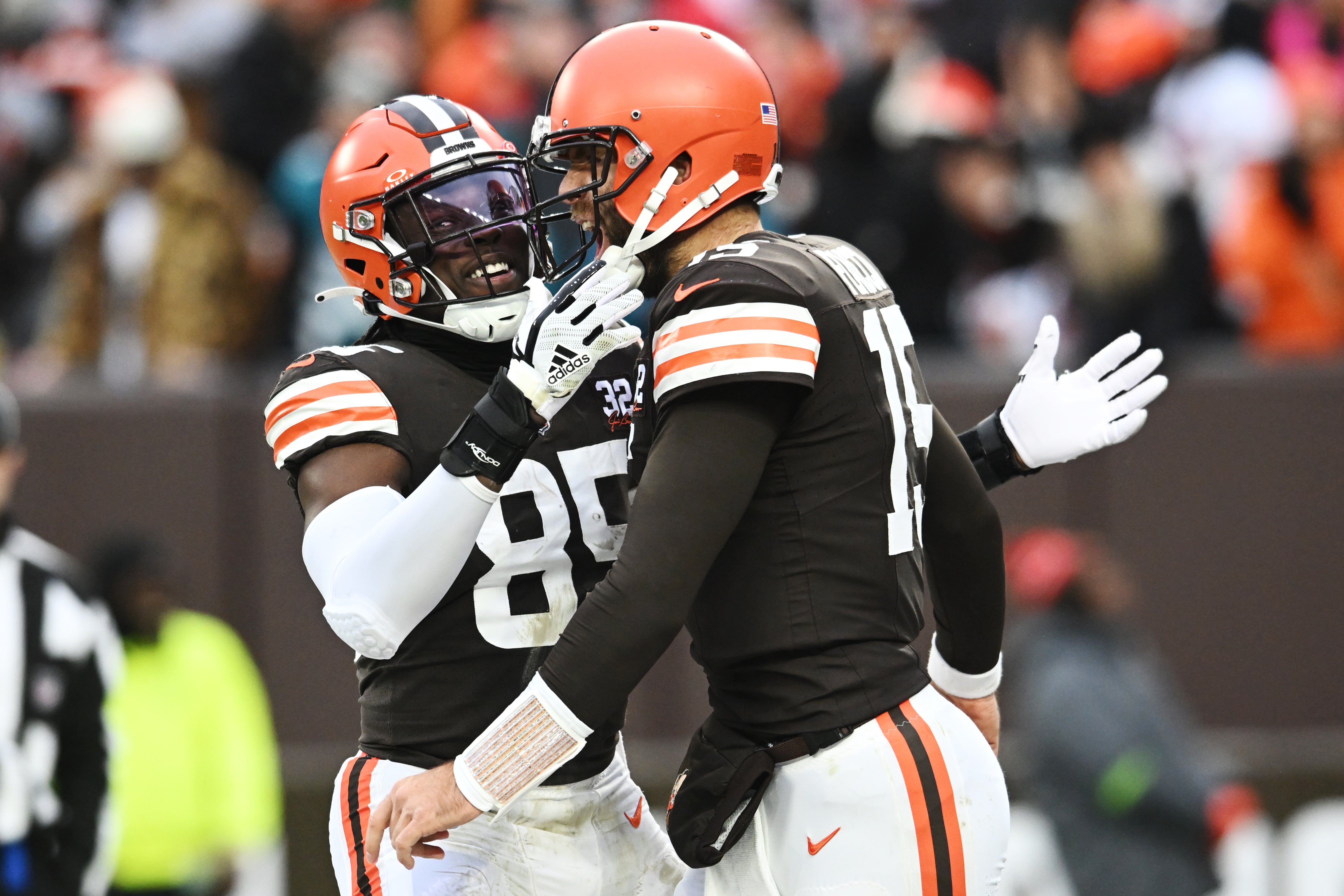 Dec 10, 2023; Cleveland, Ohio, USA; Cleveland Browns tight end David Njoku (85) and quarterback Joe Flacco (15) celebrate after Flacco threw a touchdown pass to wide receiver David Bell (not pictured) during the second half against the Jacksonville Jaguars at Cleveland Browns Stadium.