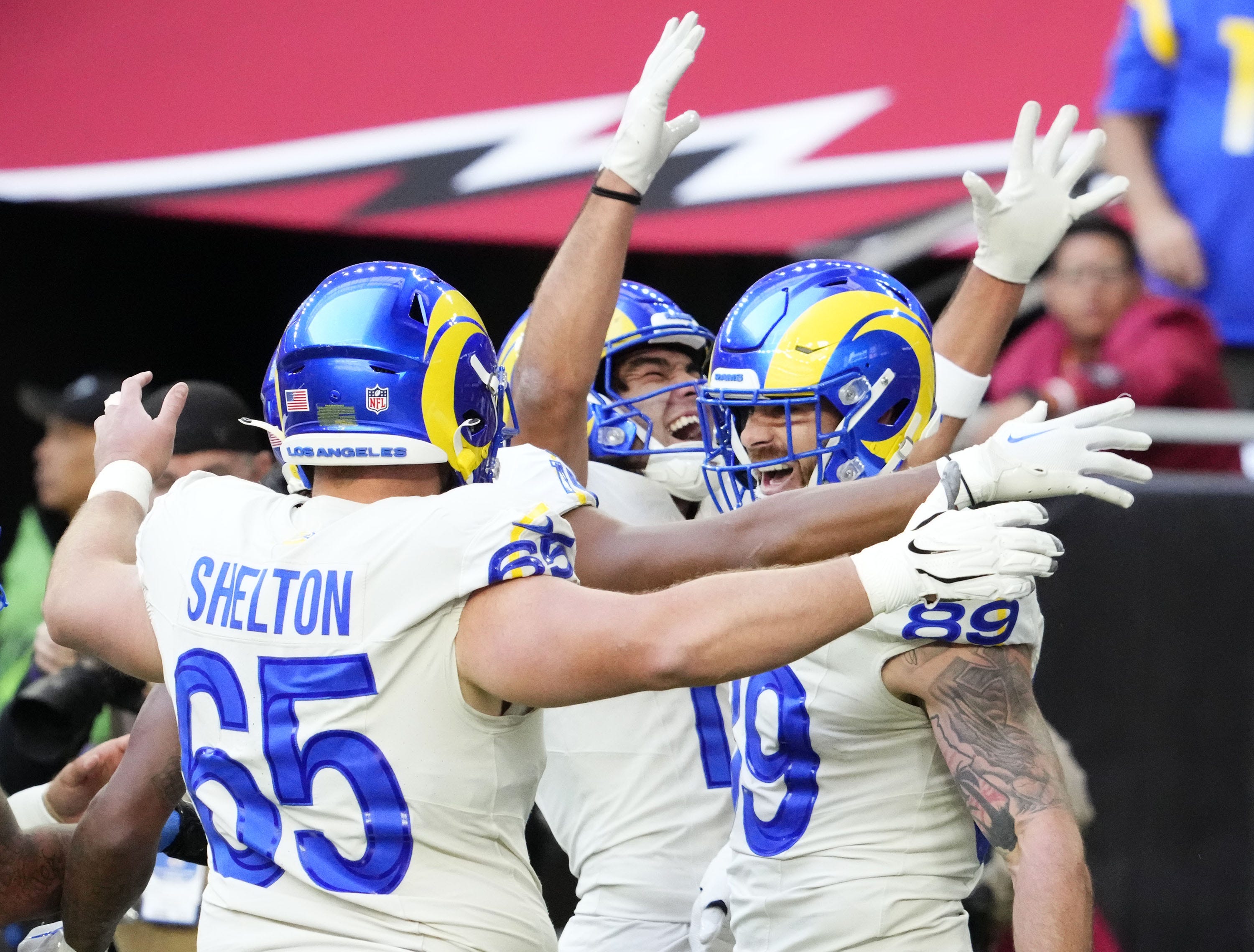 Los Angeles Rams tight end Tyler Higbee (89) reacts after making a touchdown catch against the Arizona Cardinals in the first half at State Farm Stadium in Glendale on Nov. 26, 2023.