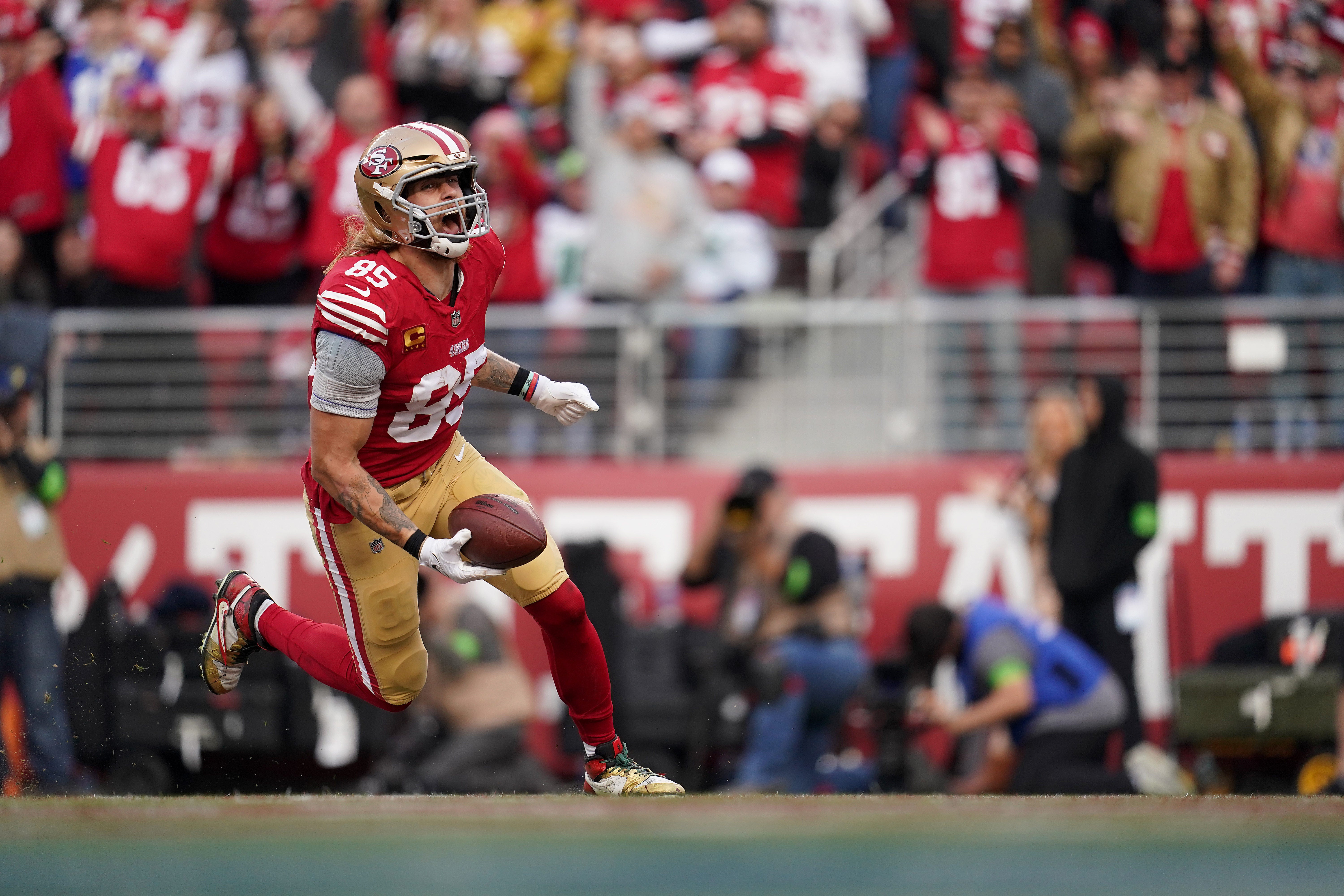 Dec 10, 2023; Santa Clara, California, USA; San Francisco 49ers tight end George Kittle (85) celebrates after scoring a touchdown against the Seattle Seahawks in the fourth quarter at Levi's Stadium.
