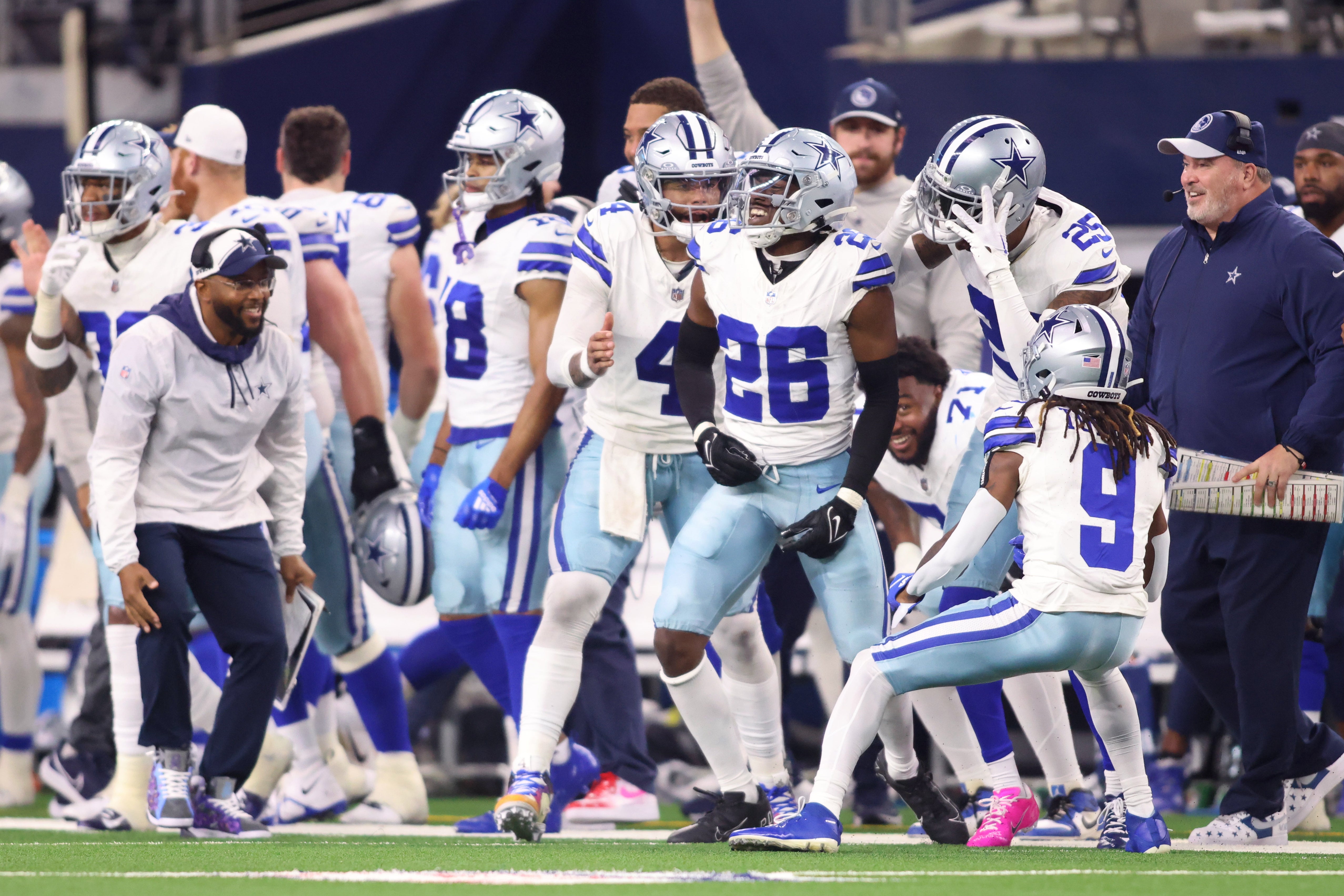 Dallas Cowboys cornerback DaRon Bland (26) celebrates with teammates during the second half against the Seattle Seahawks at AT&T Stadium.