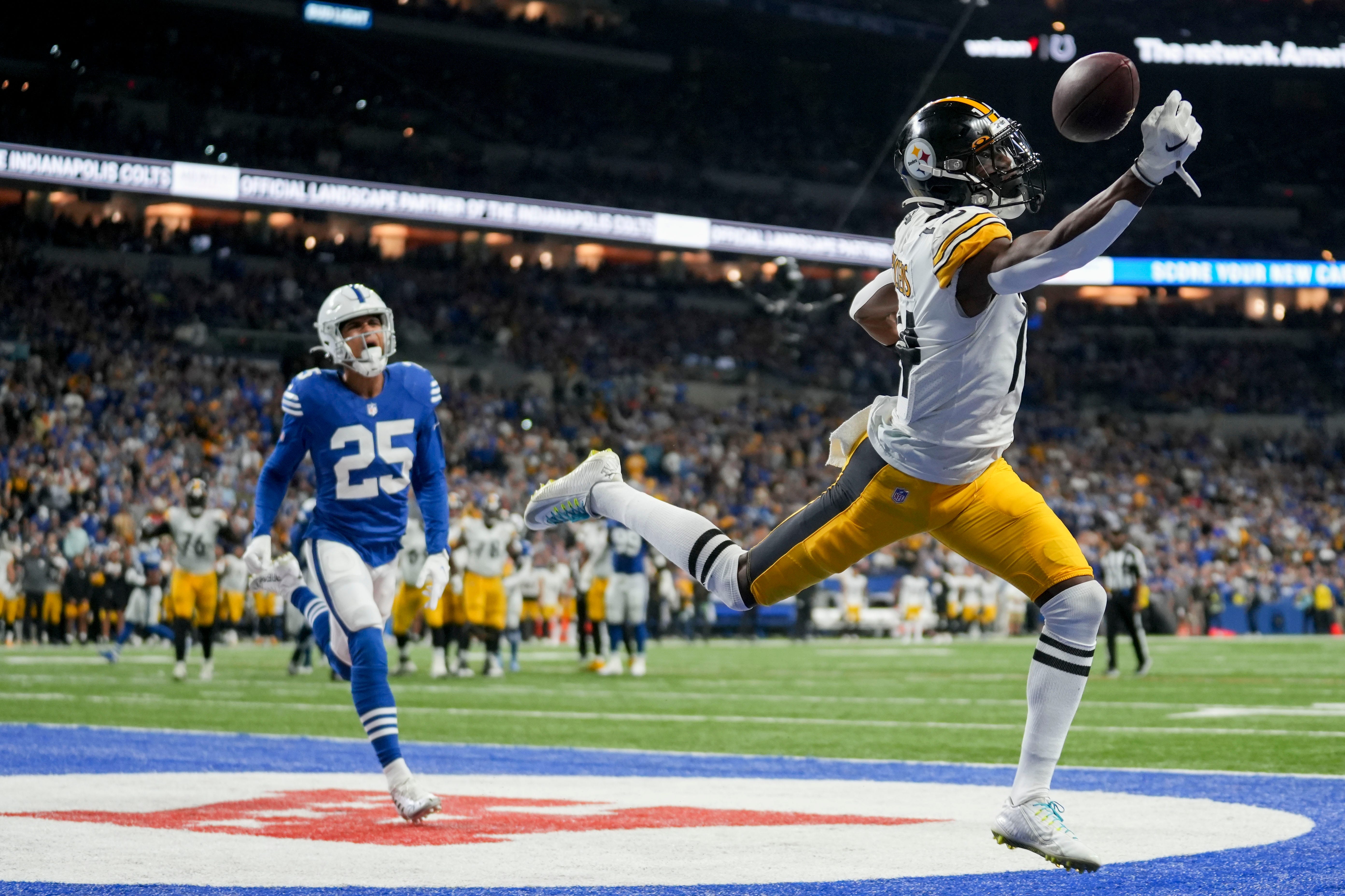 A pass intended for Pittsburgh Steelers wide receiver George Pickens (14) goes incomplete in the end zone as Indianapolis Colts safety Rodney Thomas II (25) gives chase Monday, Nov. 28, 2022, during a game against the Pittsburgh Steelers at Lucas Oil Stadium in Indianapolis.