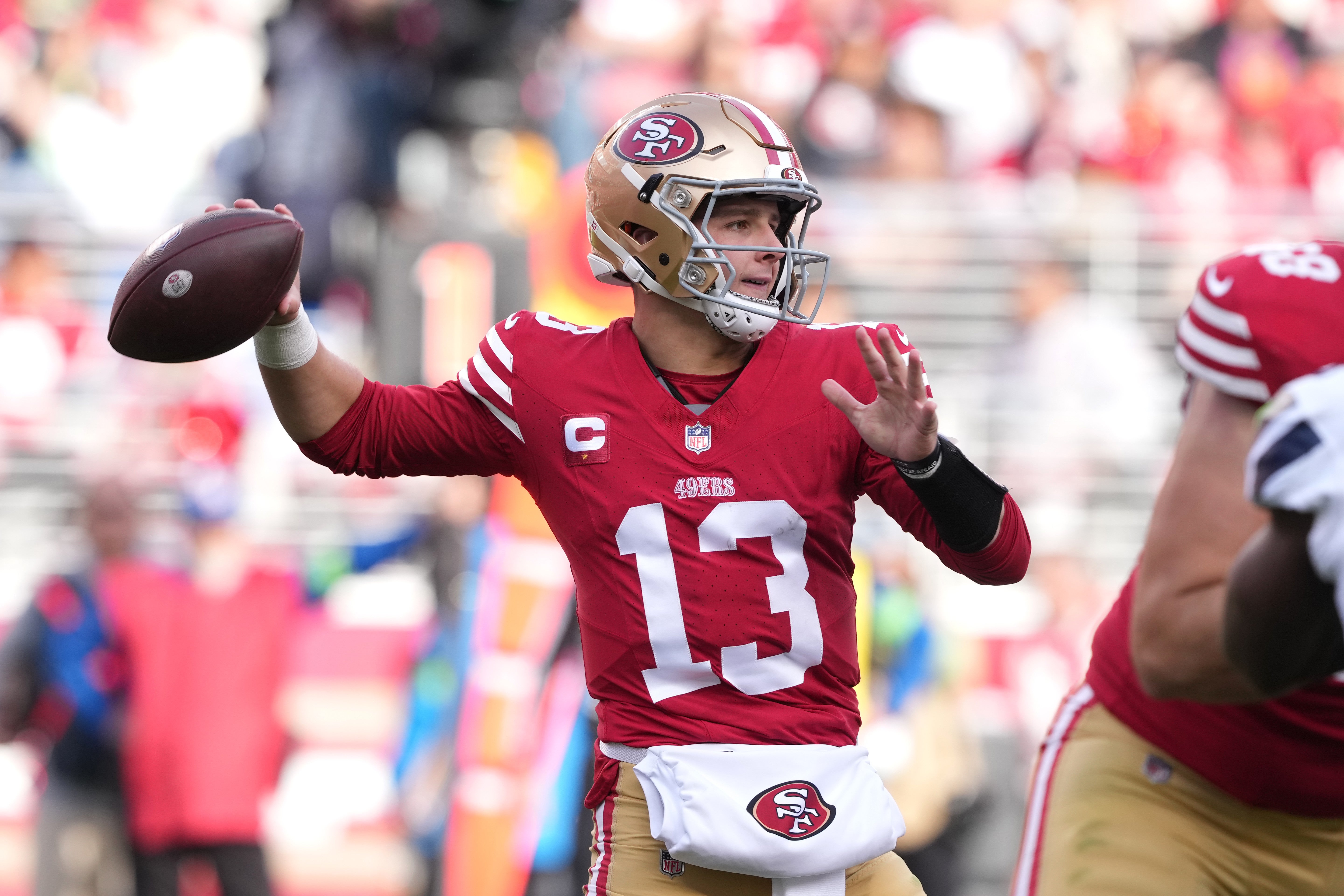 Dec 10, 2023; Santa Clara, California, USA; San Francisco 49ers quarterback Brock Purdy (13) throws a pass against the Seattle Seahawks during the second quarter at Levi's Stadium.