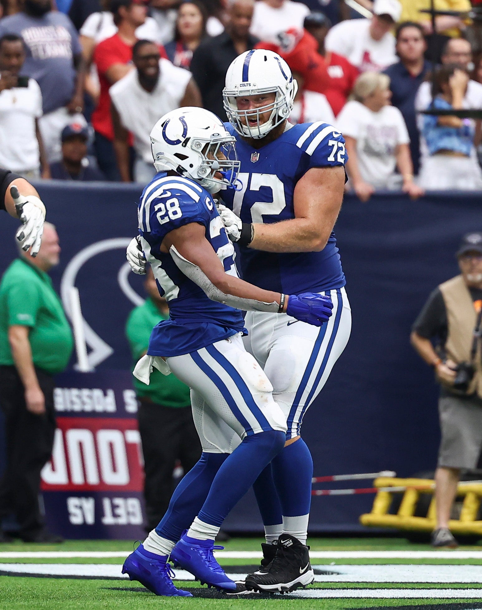 Sep 11, 2022; Houston, Texas, USA; Indianapolis Colts running back Jonathan Taylor (28) and offensive tackle Braden Smith (72) celebrate after a touchdown during the fourth quarter against the Houston Texans at NRG Stadium.