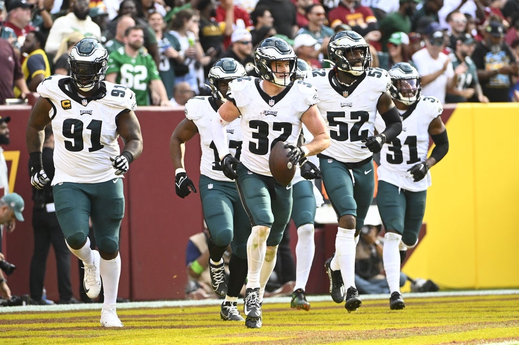 Philadelphia Eagles safety Reed Blankenship (32) celebrates after an interception against the Washington Commanders during the second half at FedExField.