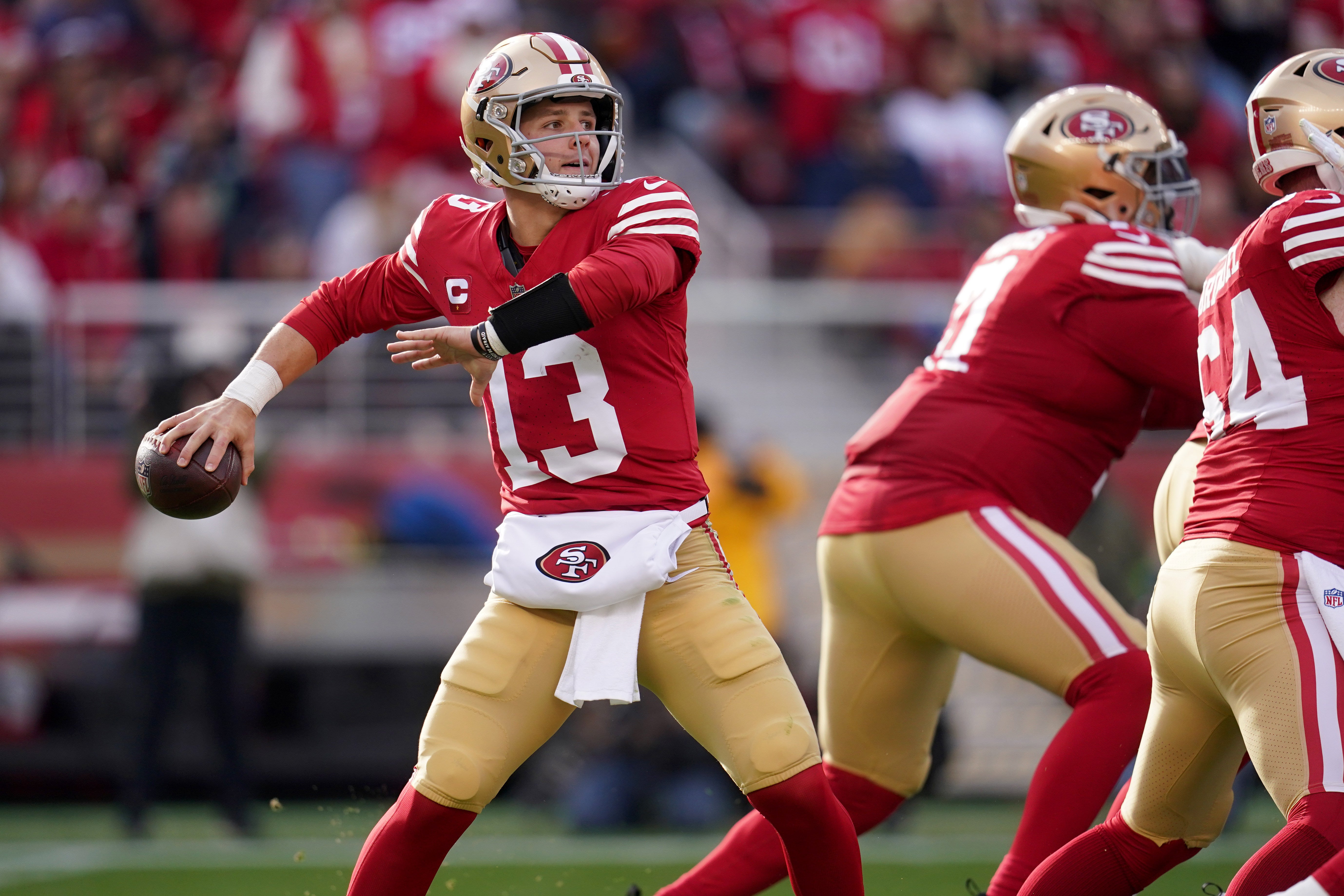 Dec 10, 2023; Santa Clara, California, USA; San Francisco 49ers quarterback Brock Purdy (13) throws a pass against the Seattle Seahawks in the first quarter at Levi's Stadium.