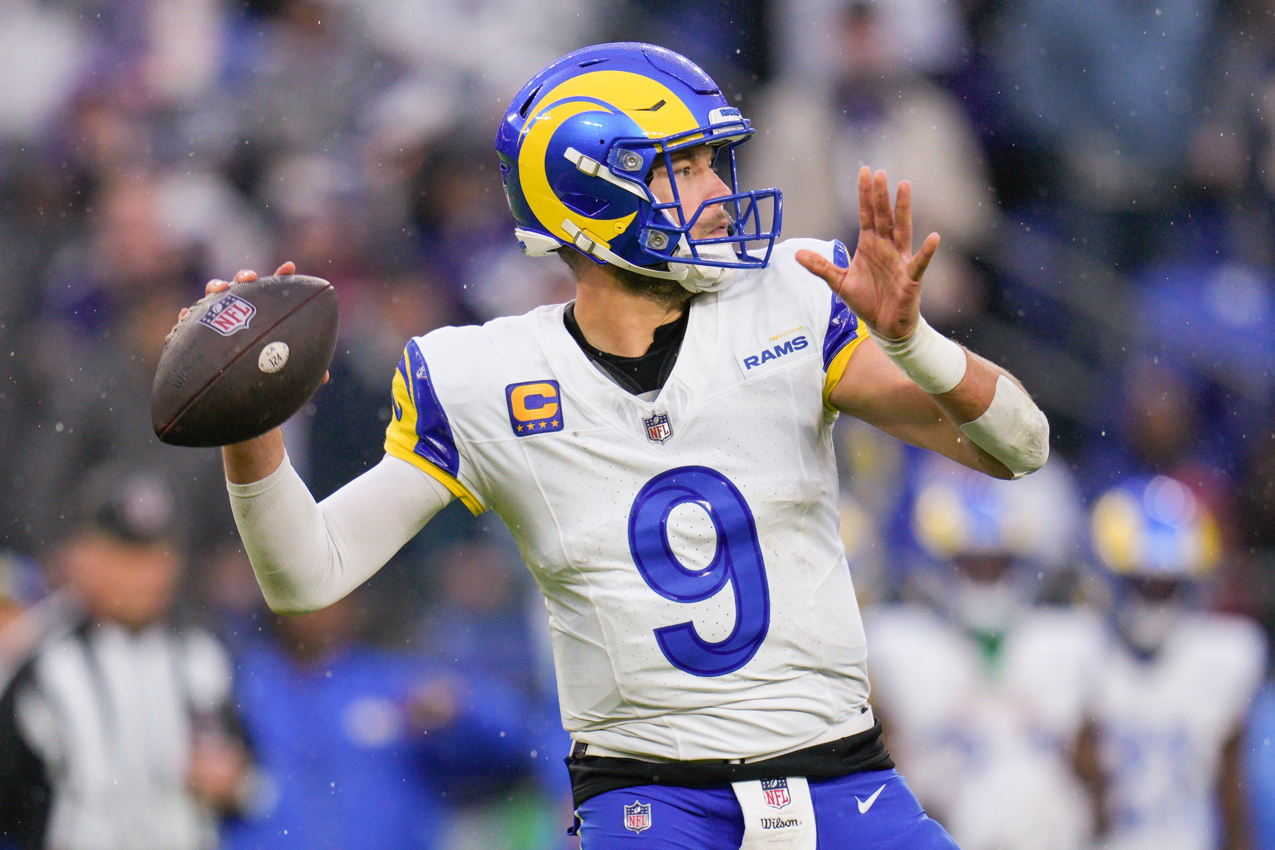 Dec 10, 2023; Baltimore, Maryland, USA; Los Angeles Rams quarterback Matthew Stafford (9) passses against the Baltimore Ravens during the second half at M&T Bank Stadium. Mandatory Credit: Jessica Rapfogel-USA TODAY Sports