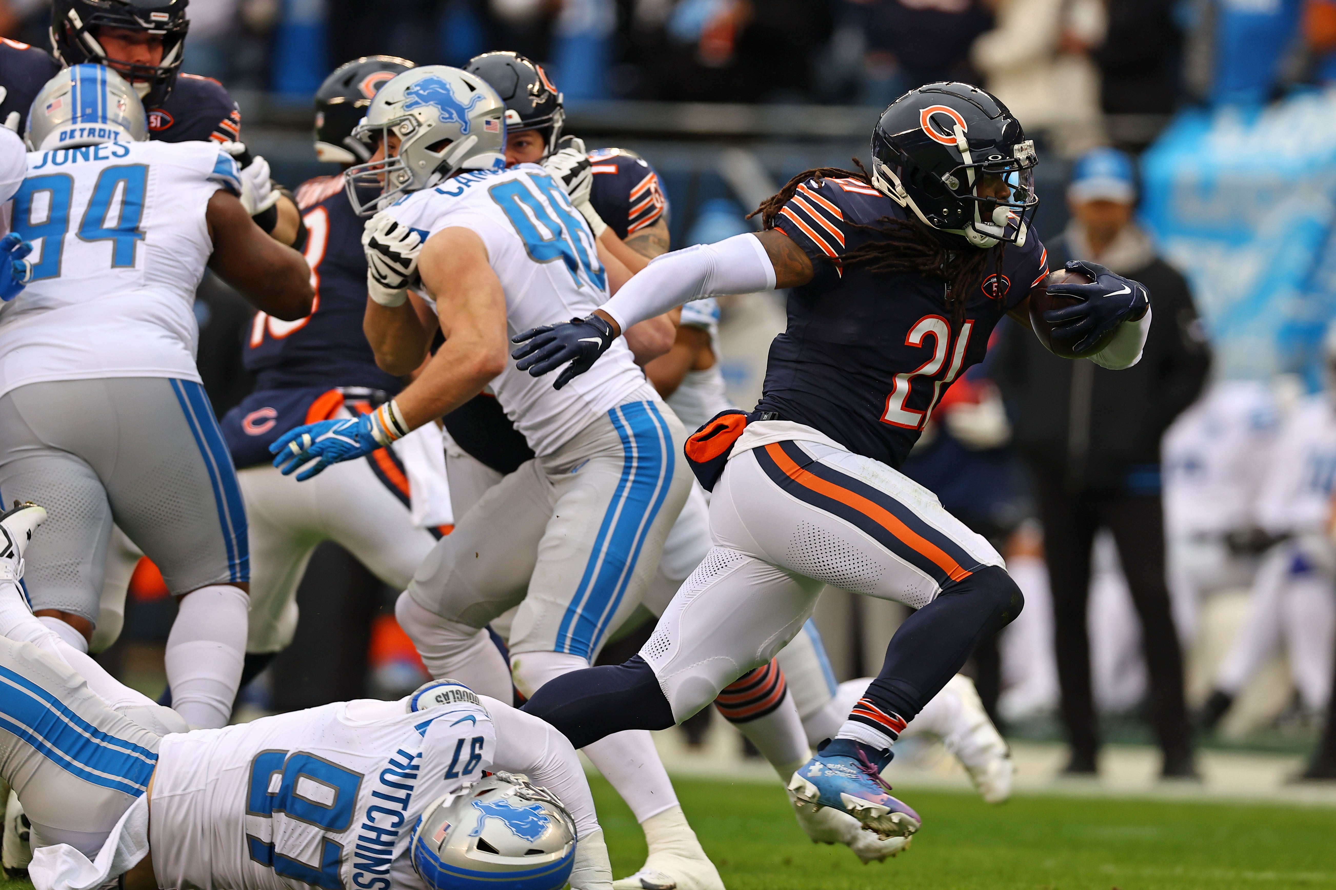 Dec 10, 2023; Chicago, Illinois, USA; Chicago Bears running back D'Onta Foreman (21) rushes the ball against the Detroit Lions during the first half at Soldier Field.