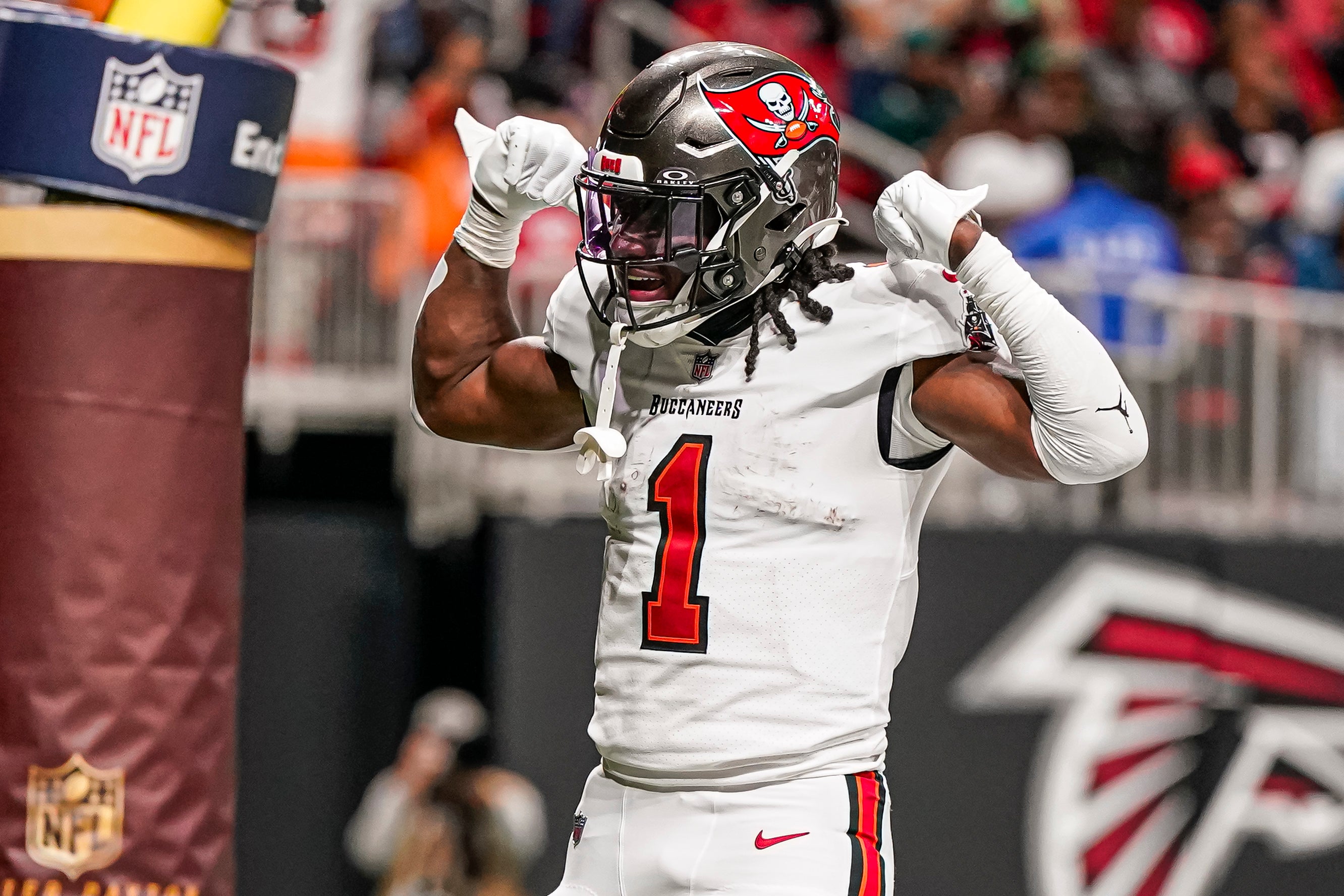 Dec 10, 2023; Atlanta, Georgia, USA; Tampa Bay Buccaneers running back Rachaad White (1) reacts after scoring a touchdown against the Atlanta Falcons at Mercedes-Benz Stadium. Mandatory Credit: Dale Zanine-USA TODAY Sports