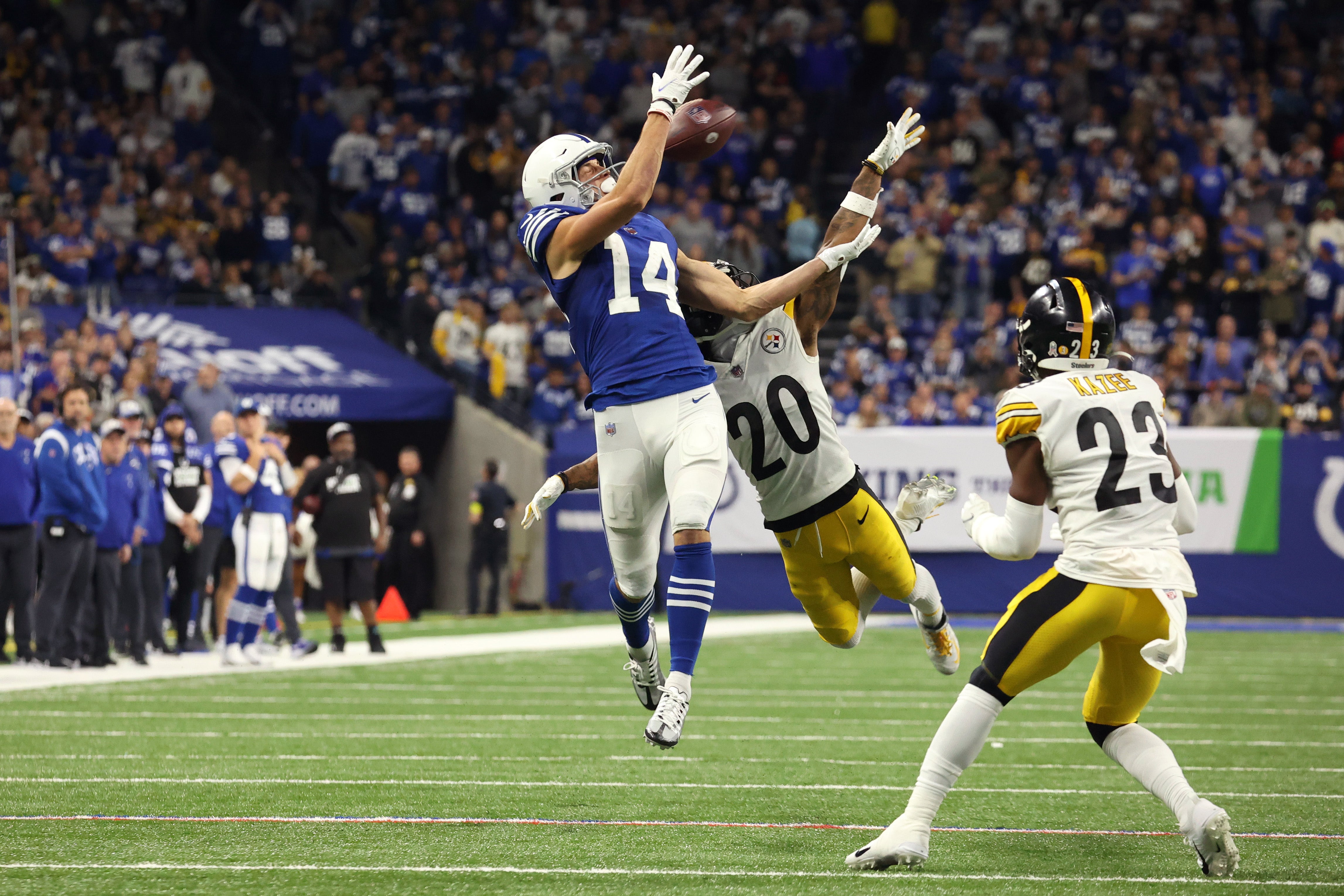 Nov 28, 2022; Indianapolis, Indiana, USA; Indianapolis Colts wide receiver Alec Pierce (14) cannot make the catch while defended by Pittsburgh Steelers cornerback Cameron Sutton (20) during the second half at Lucas Oil Stadium.