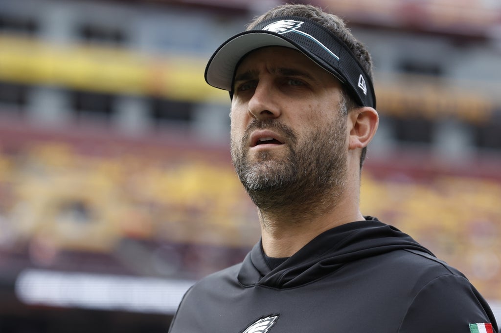 Philadelphia Eagles head coach Nick Sirianni stands on the field during warmup prior to the game Washington Commanders at FedExField.