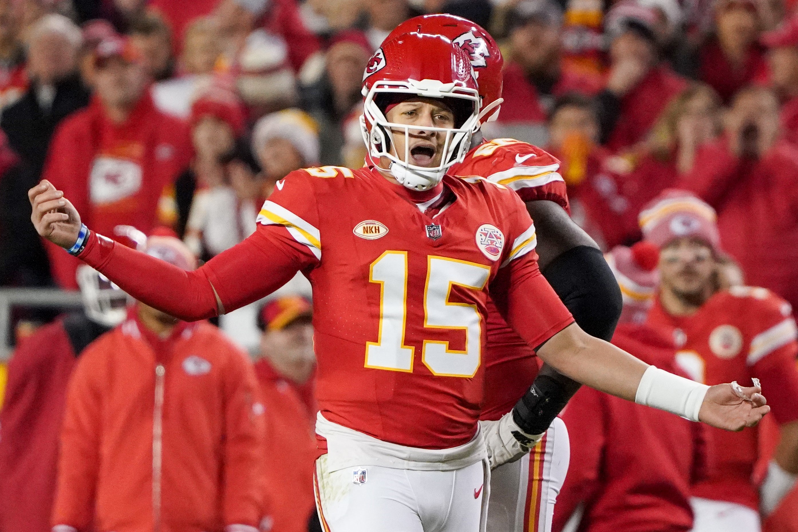 Kansas City Chiefs quarterback Patrick Mahomes gestures to an official after a play against the Buffalo Bills during the second half at GEHA Field at Arrowhead Stadium