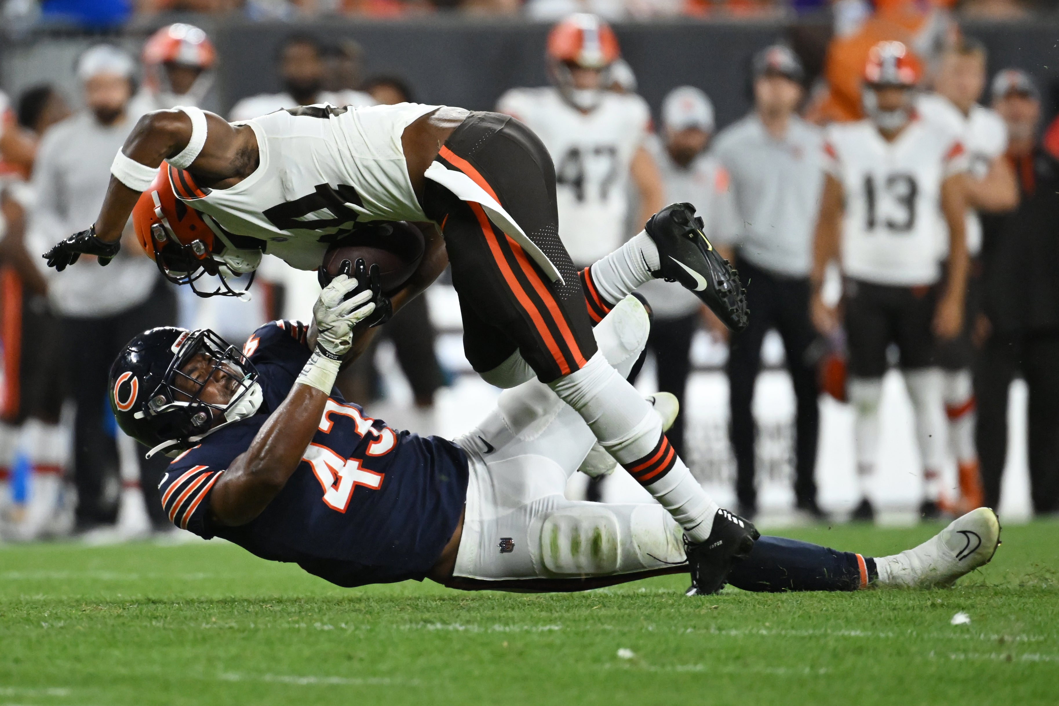 Aug 27, 2022; Cleveland, Ohio, USA; Chicago Bears linebacker DeMarquis Gates (43) tackles during the second half at FirstEnergy Stadium.