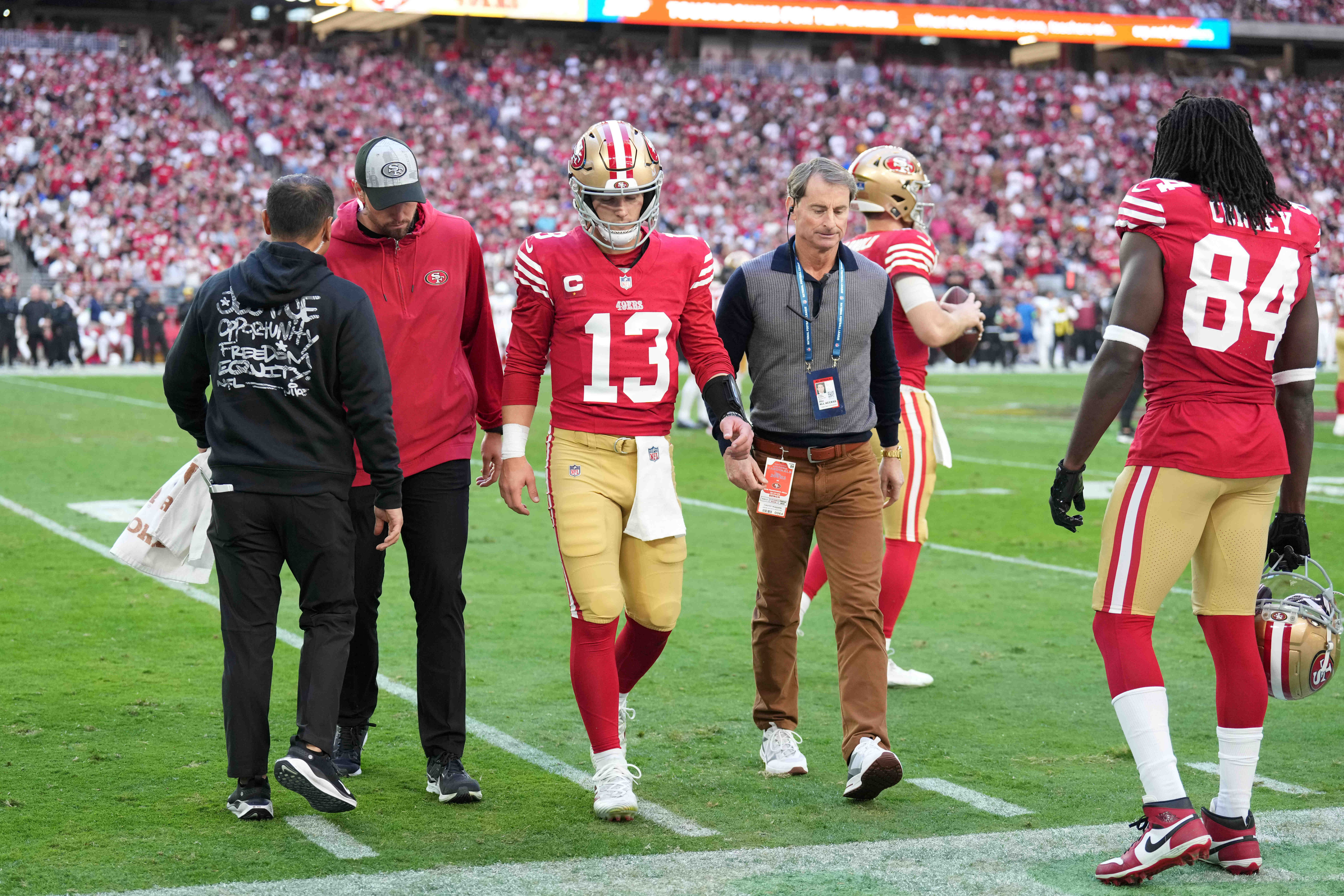 Dec 17, 2023; Glendale, Arizona, USA; San Francisco 49ers quarterback Brock Purdy (13) leaves the game against the Arizona Cardinals with an injury during the first half at State Farm Stadium.