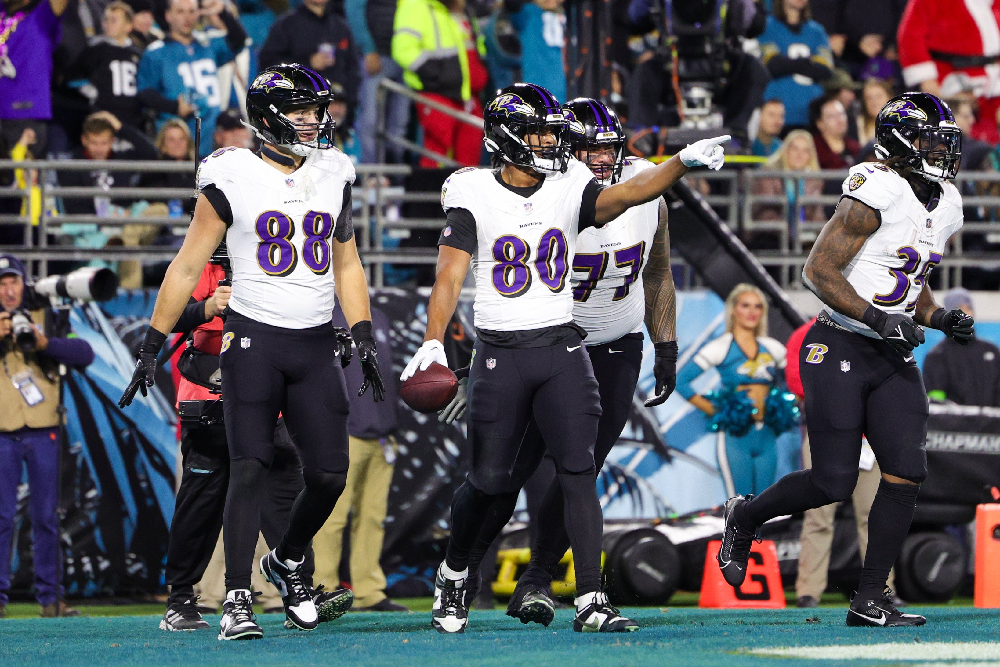 Baltimore Ravens tight end Isaiah Likely (80) celebrates after scoring a touchdown against the Jacksonville Jaguars in the second quarter at EverBank Stadium.