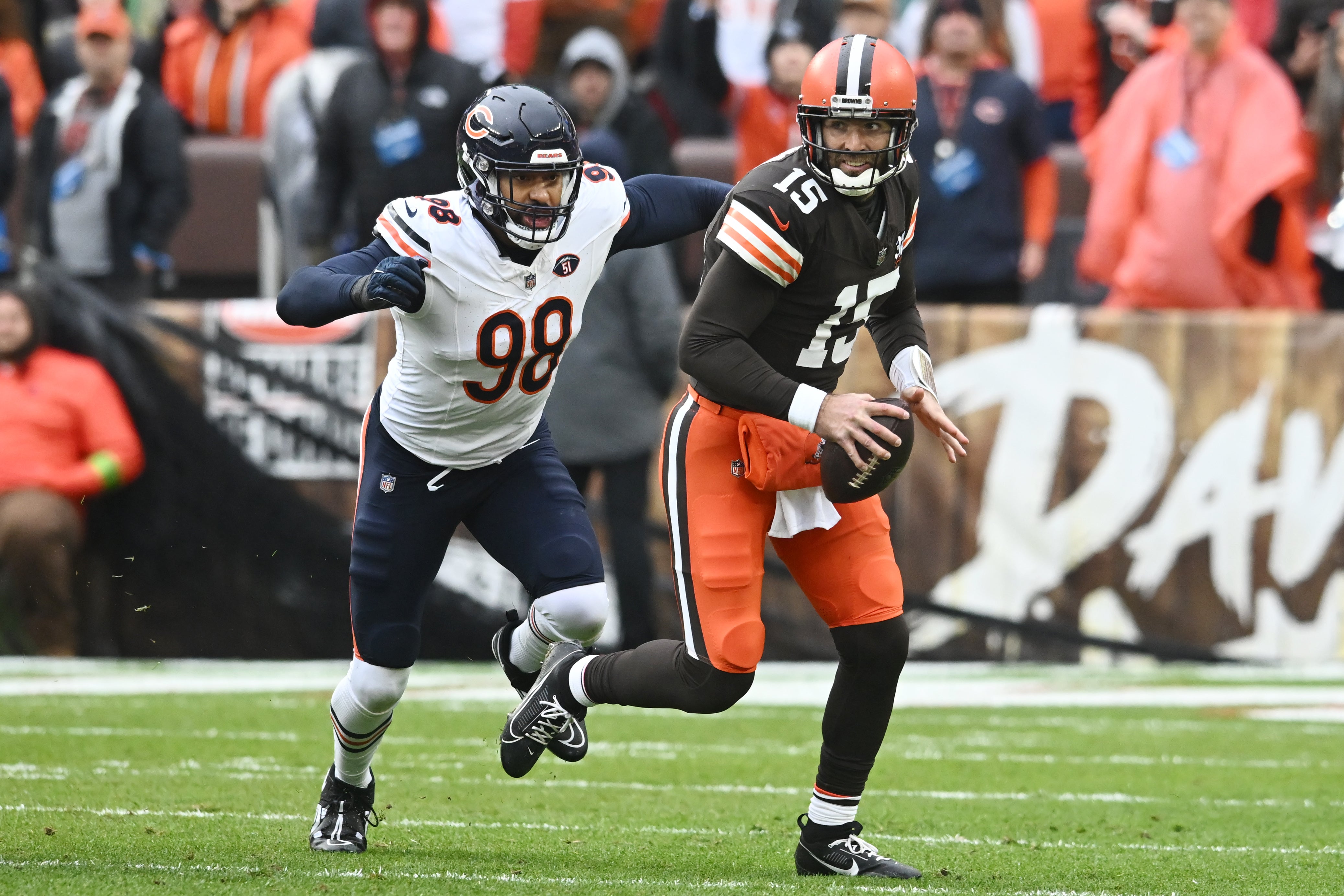 Dec 17, 2023; Cleveland, Ohio, USA; Chicago Bears defensive end Montez Sweat (98) chases Cleveland Browns quarterback Joe Flacco (15) during the first quarter at Cleveland Browns Stadium.
