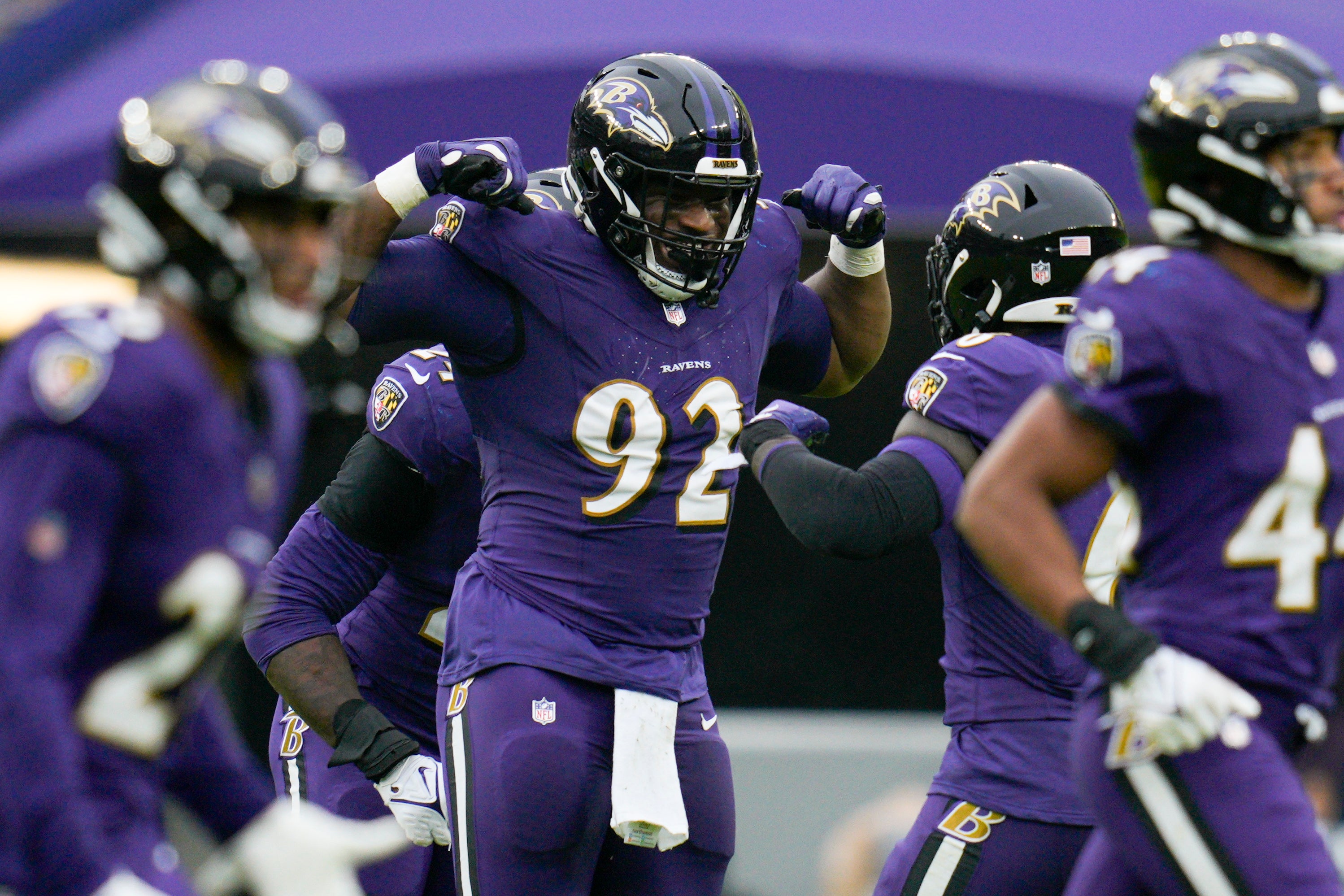 Baltimore Ravens defensive tackle Nnamdi Madubuike (92) celebrates a sack against the Los Angeles Rams during the first quarter at M&T Bank Stadium.