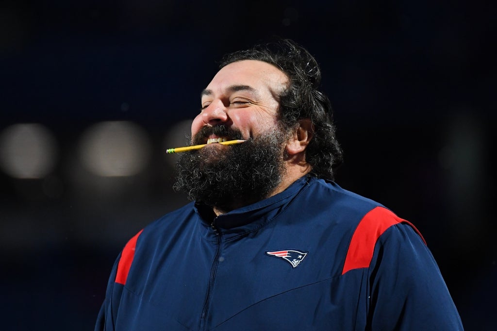 New England Patriots senior football advisor Matt Patricia smiles with a pencil in his mouth prior to the game against the Buffalo Bills at Highmark Stadium.