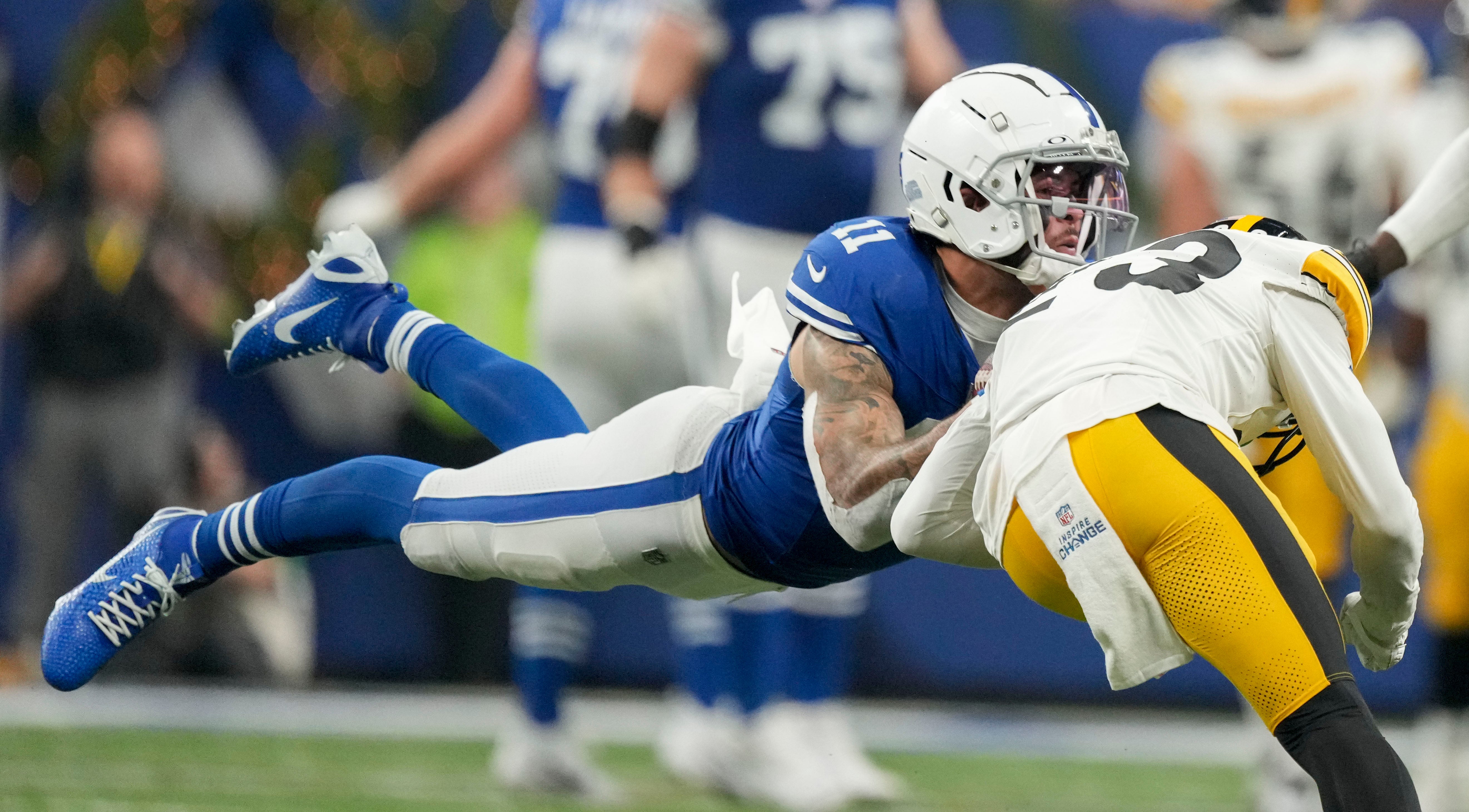 Dec 16, 2023; Indianapolis, Indiana, USA; Indianapolis Colts wide receiver Michael Pittman Jr. (11) collides with Pittsburgh Steelers safety Damontae Kazee (23) during a game against the Pittsburgh Steelers at Lucas Oil Stadium. Mandatory Credit: Robert Scheer-USA TODAY Sports