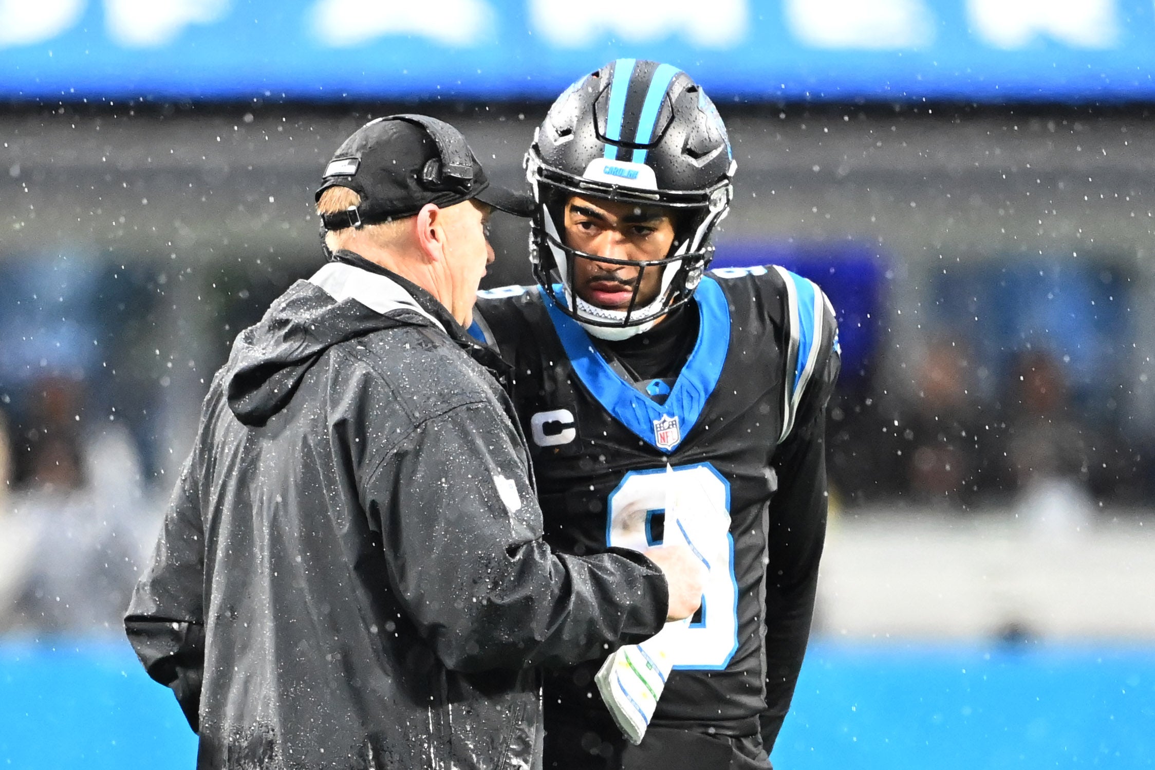 Dec 17, 2023; Charlotte, North Carolina, USA; Carolina Panthers quarterback Bryce Young (9) with head coach Chris Tabor in the fourth quarter at Bank of America Stadium. Mandatory Credit: Bob Donnan-USA TODAY Sports